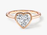 Rose gold ring with a heart-shaped diamond engagement ring