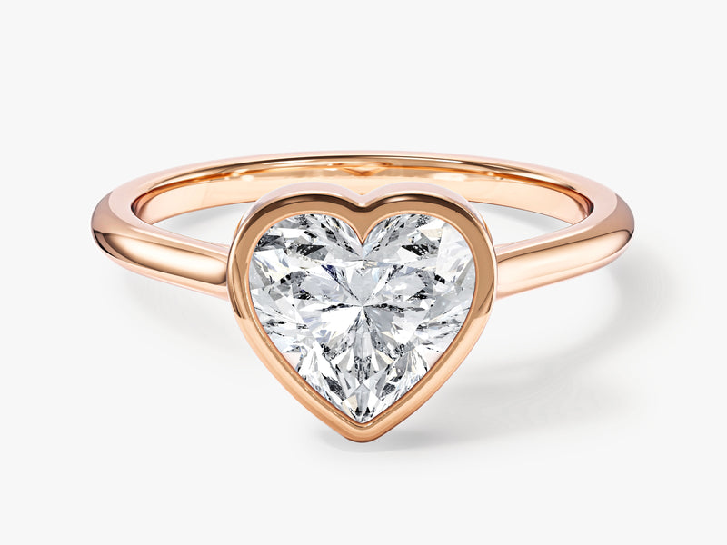 Rose gold ring with a heart-shaped diamond engagement ring