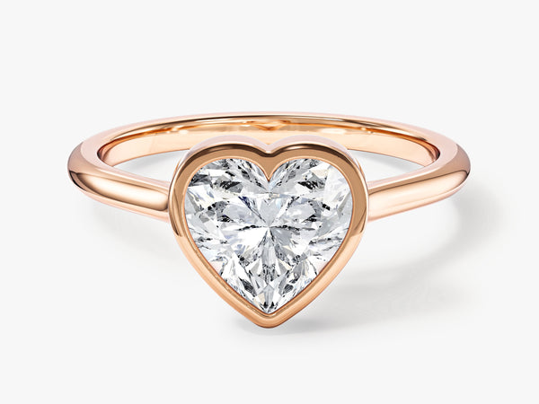 Rose gold ring with heart-shaped diamond engagement ring