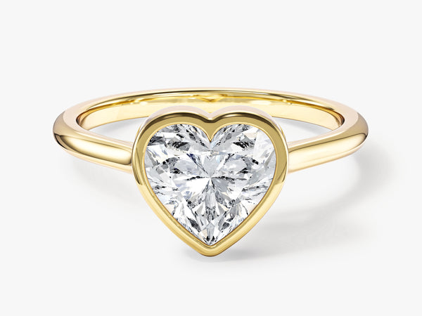 Gold ring with heart-shaped diamond, fine jewelry