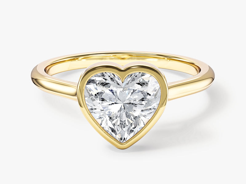 Gold ring with heart-shaped diamond, fine jewelry
