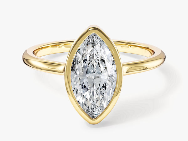 Marquise diamond engagement ring in yellow gold setting
