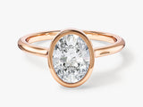 Oval diamond engagement ring in rose gold setting