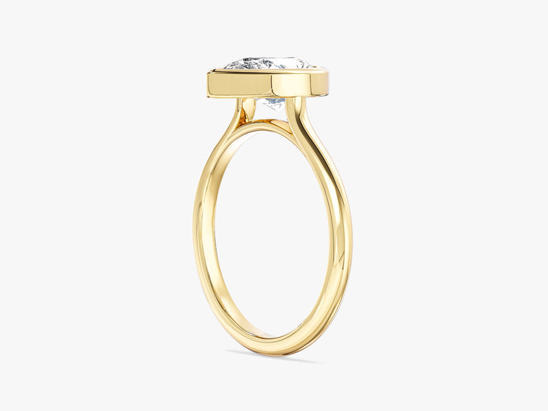 Gold ring with bezel-set diamond, fine jewelry