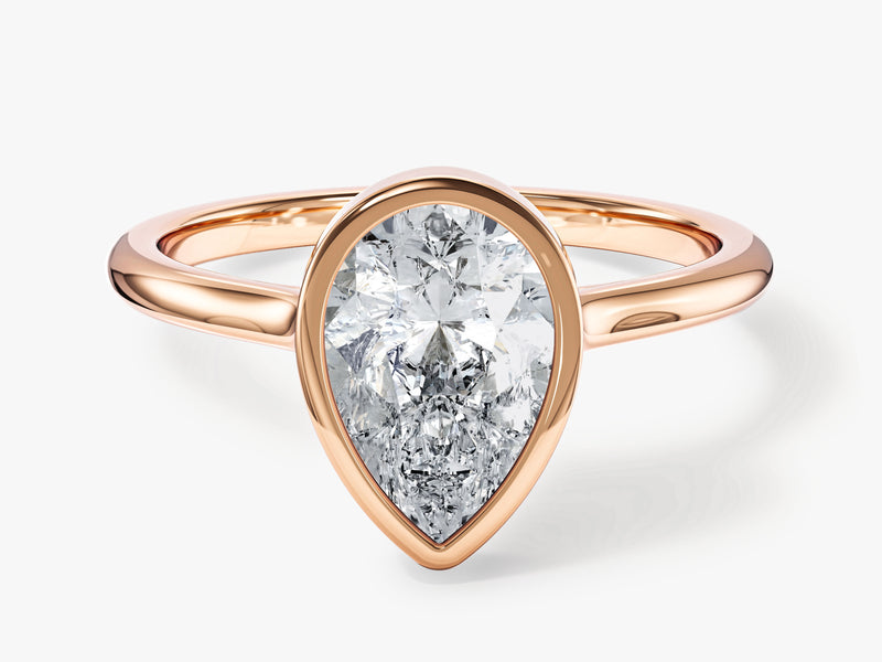 Rose gold pear cut diamond engagement ring