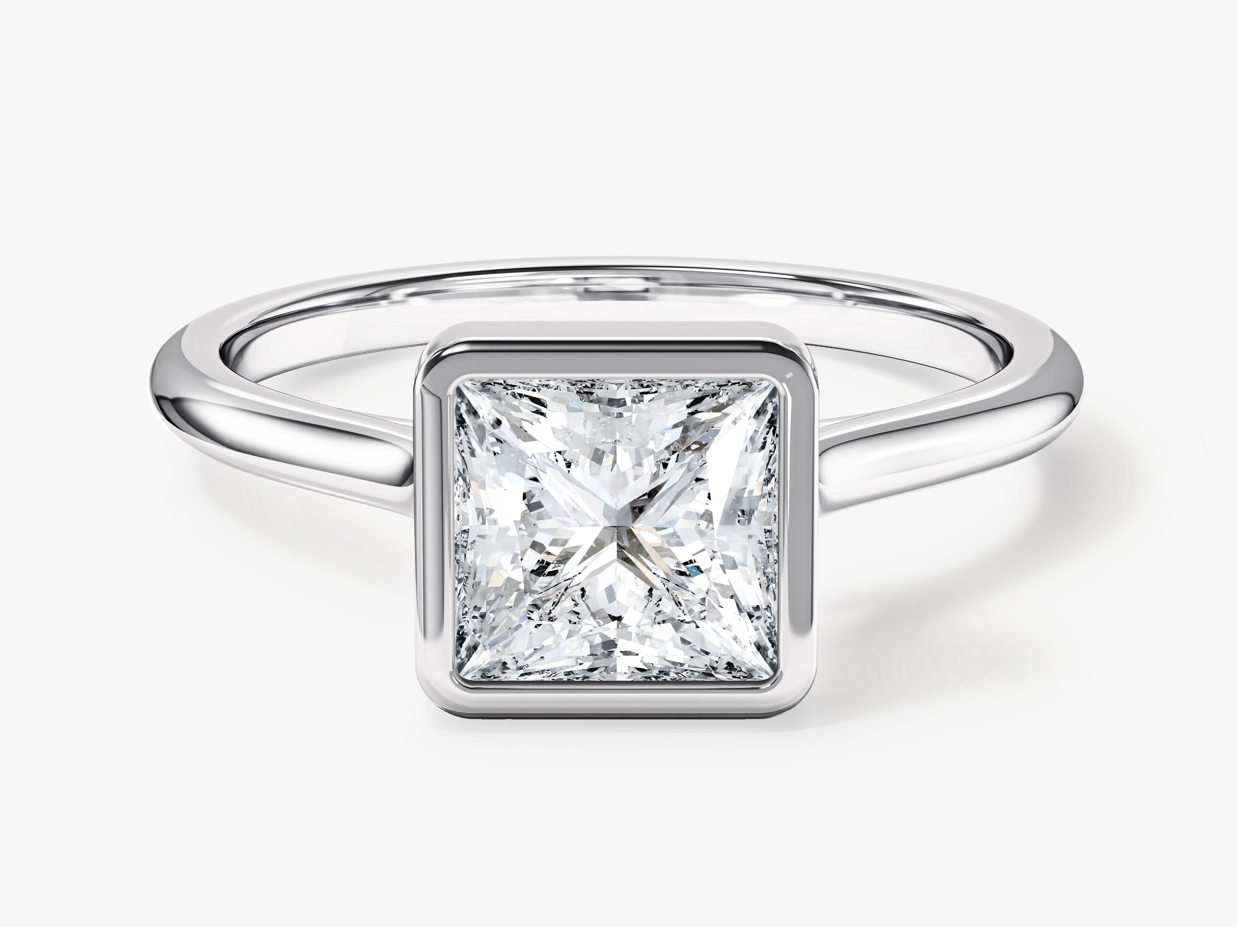 Princess cut diamond engagement ring in a bezel setting