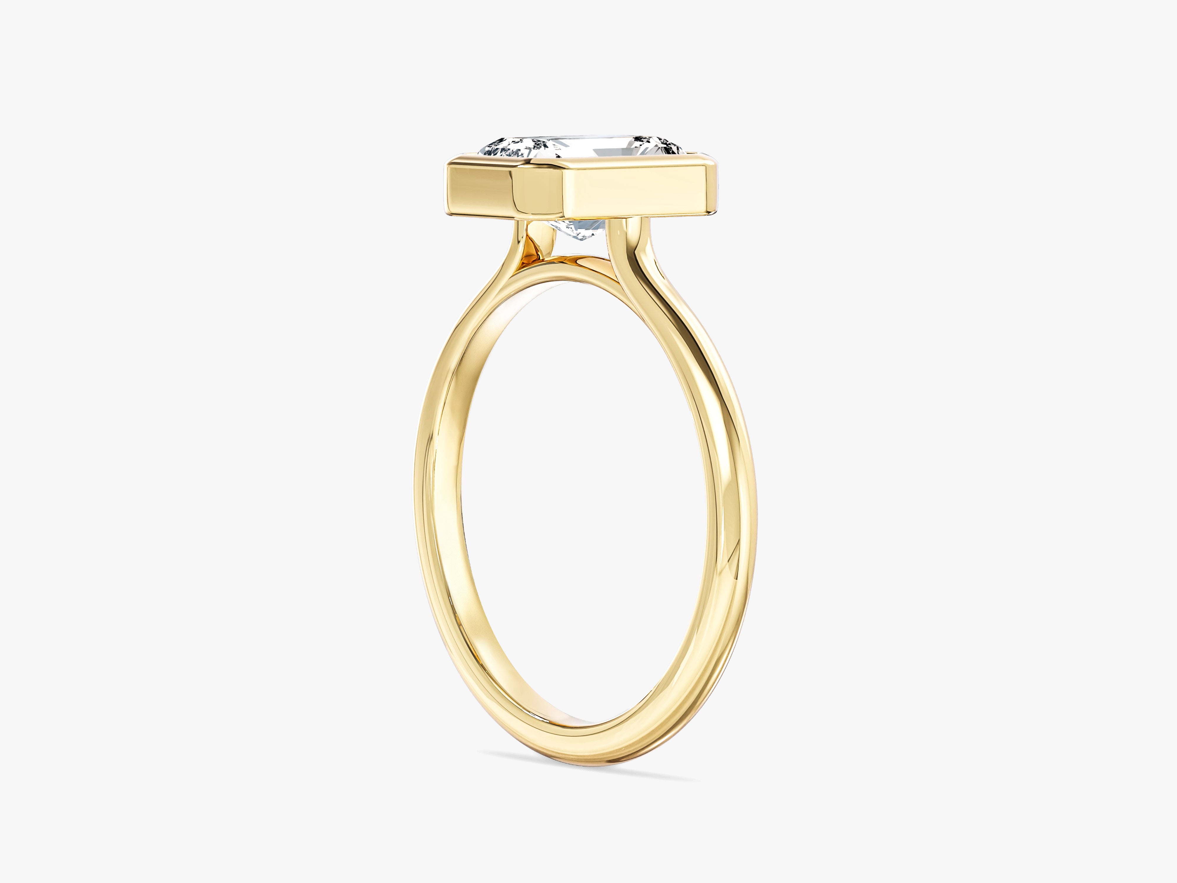 Gold ring with a radiant diamond solitaire setting