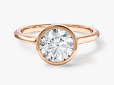 Rose gold bezel set diamond engagement ring