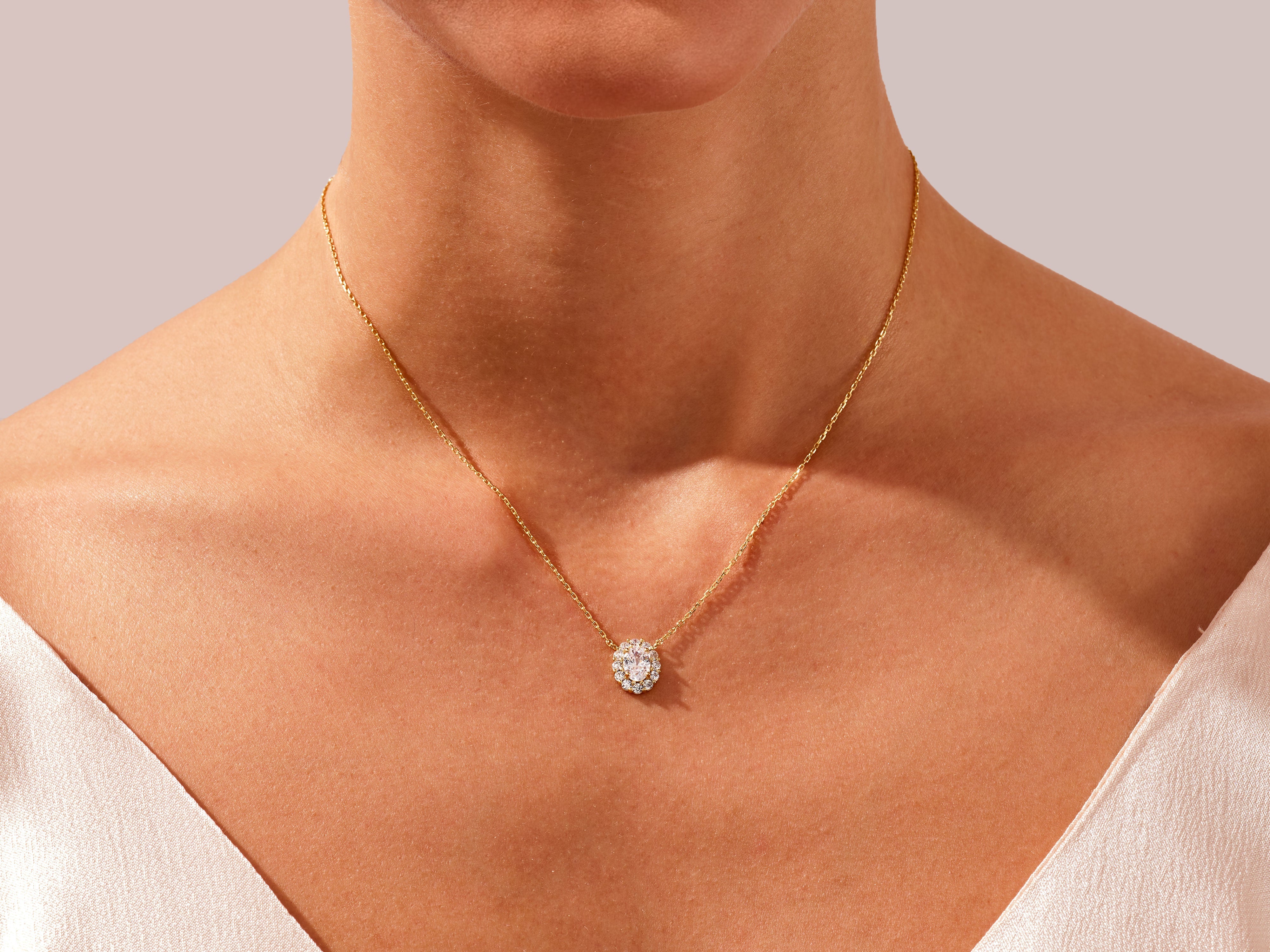Diamond heart necklace on a woman's neck, fine jewelry