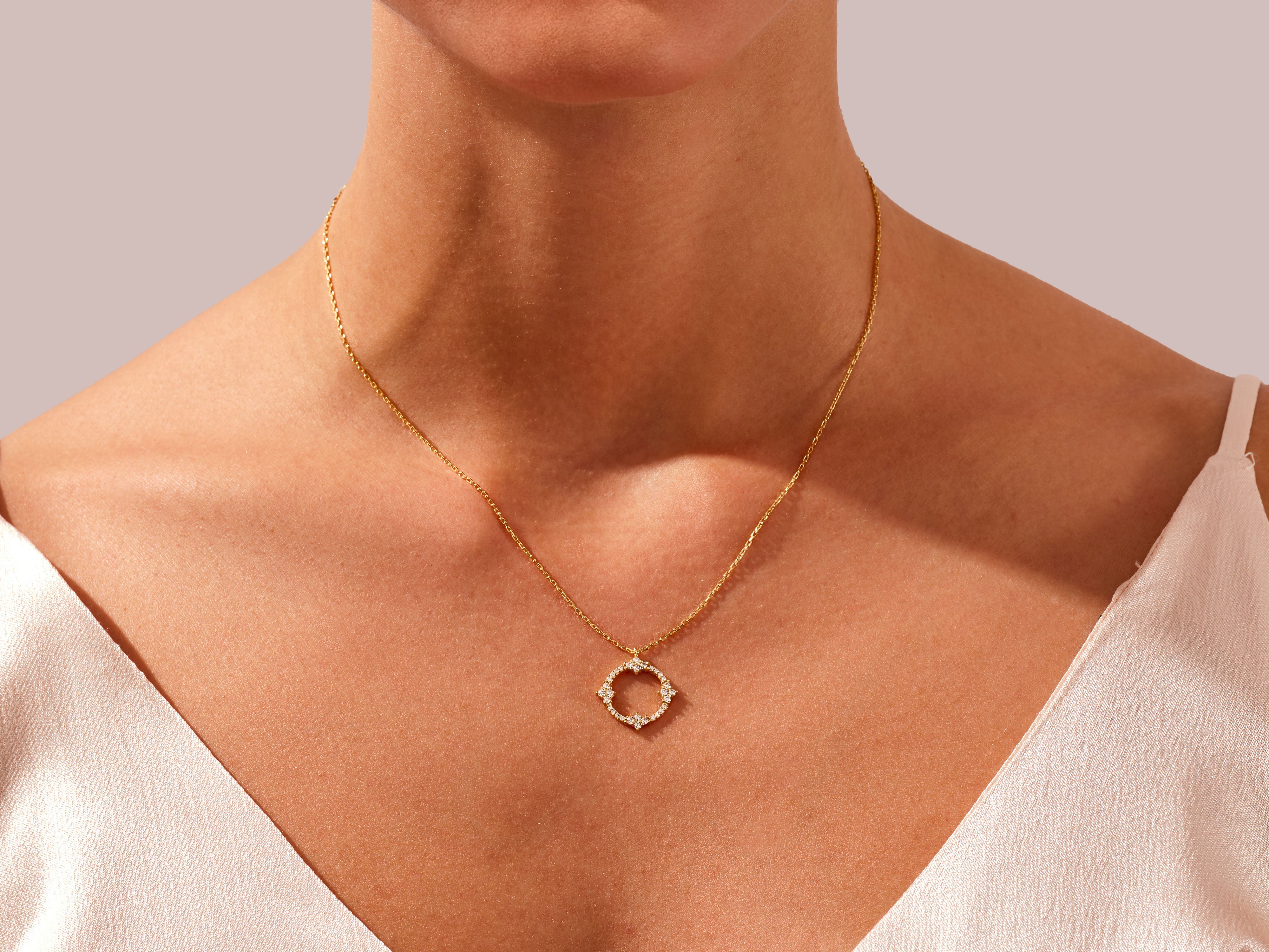 Gold diamond necklace on a woman's neck, jewelry