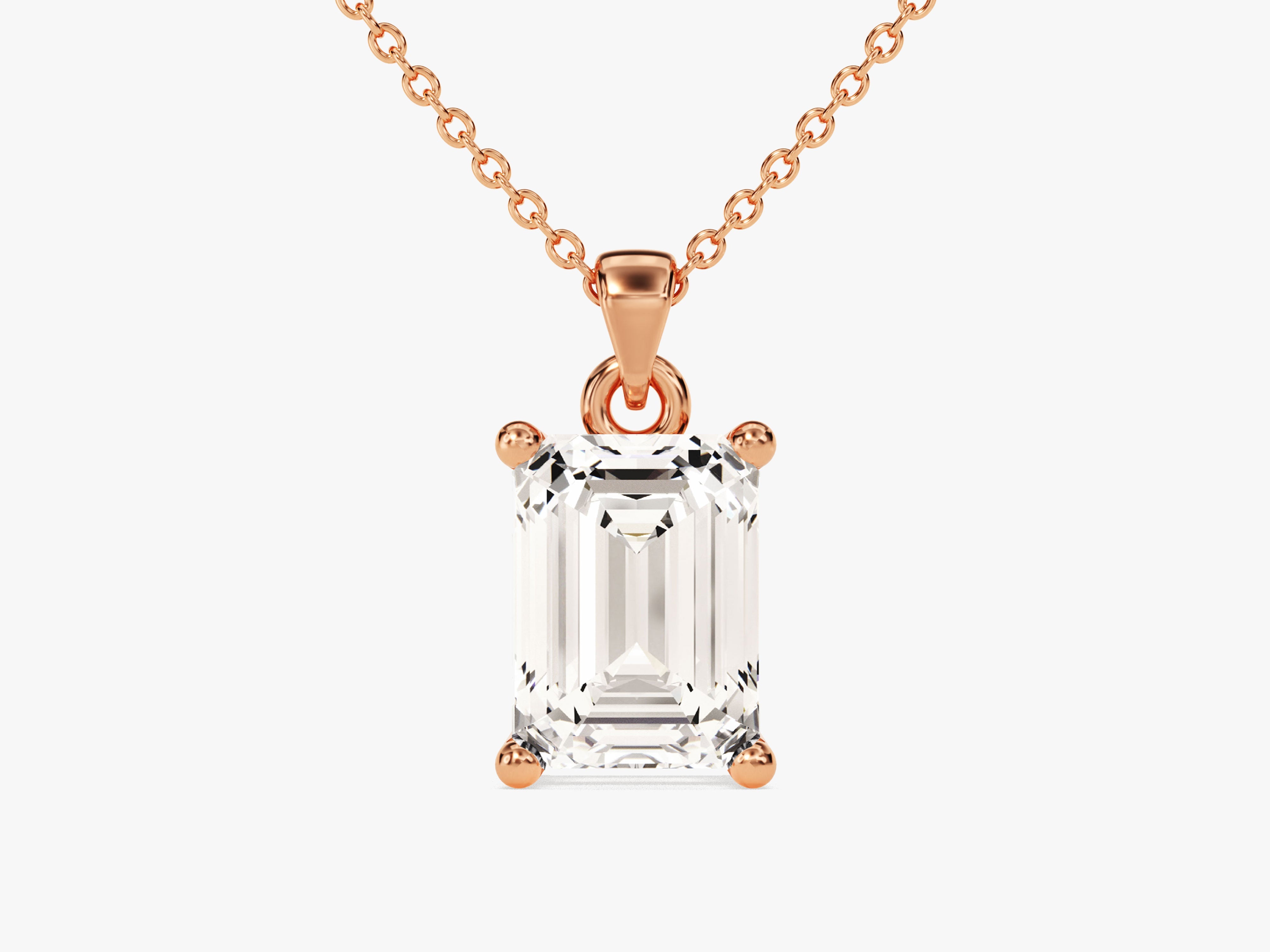 Emerald cut diamond pendant necklace in rose gold