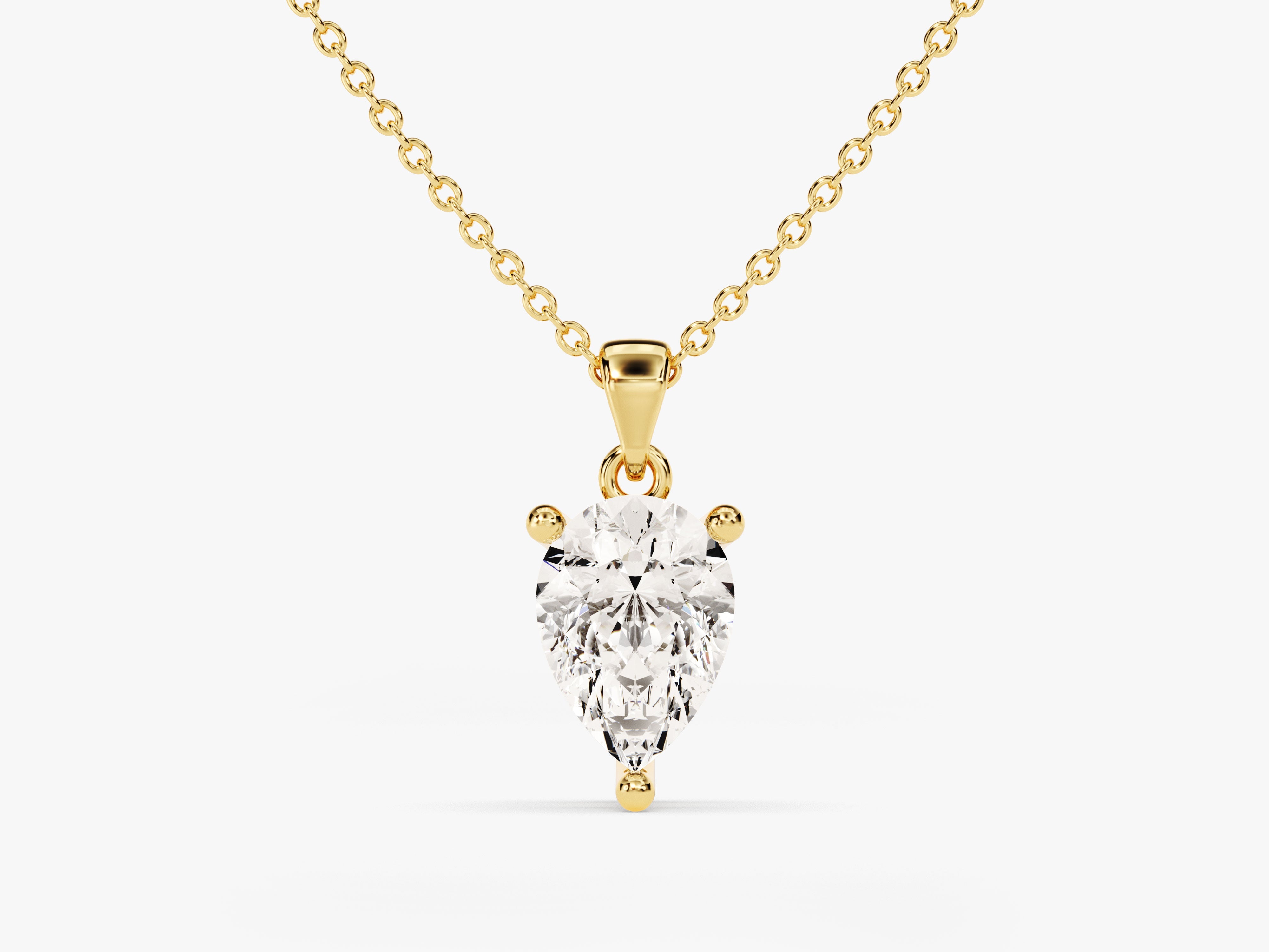 Gold chain necklace with pear-shaped diamond pendant