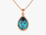 Blue Topaz Bezel Set Pear Pendant Necklace in 14k Solid Gold