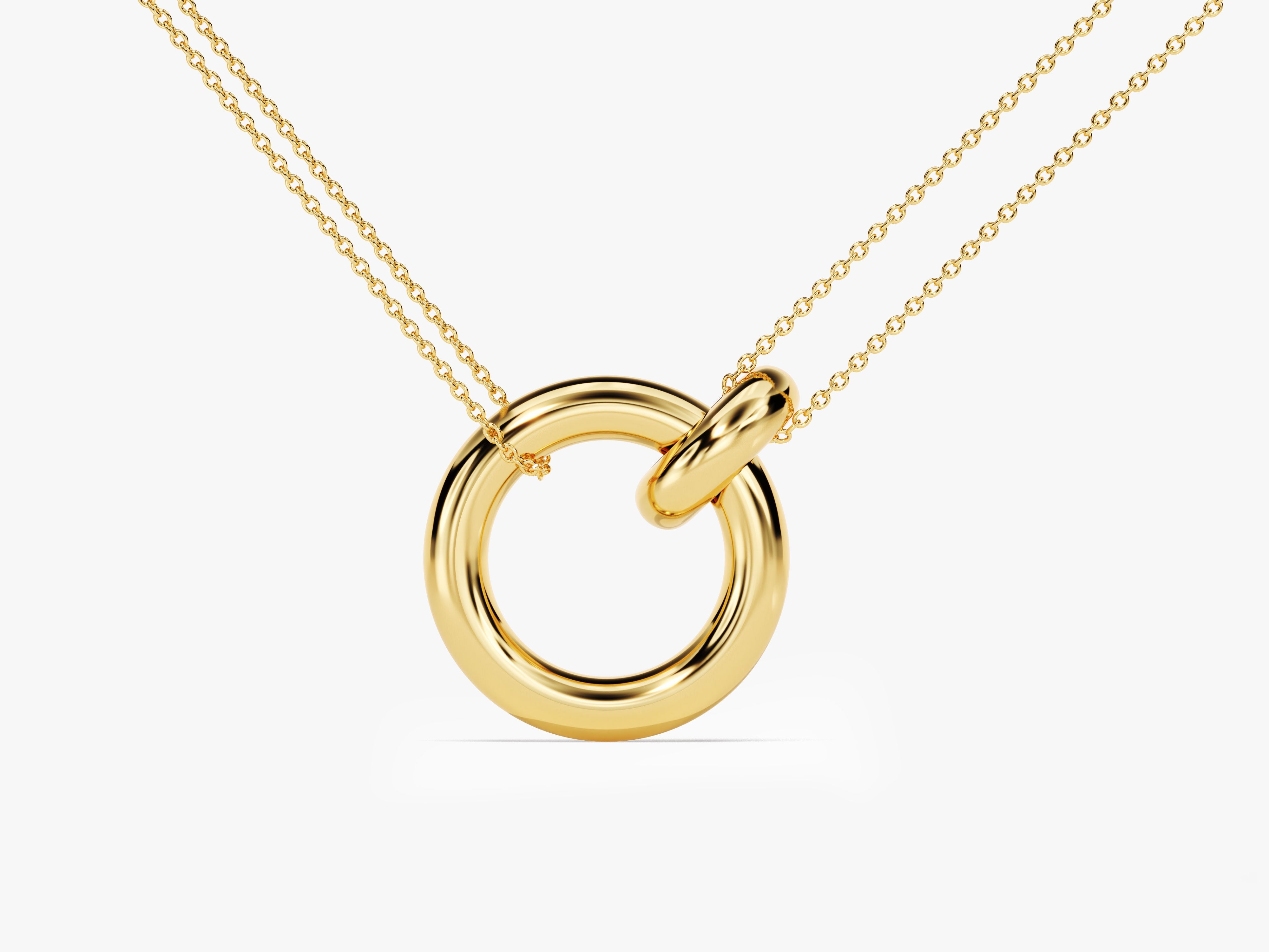 Gold double chain necklace with interlocking circle pendant