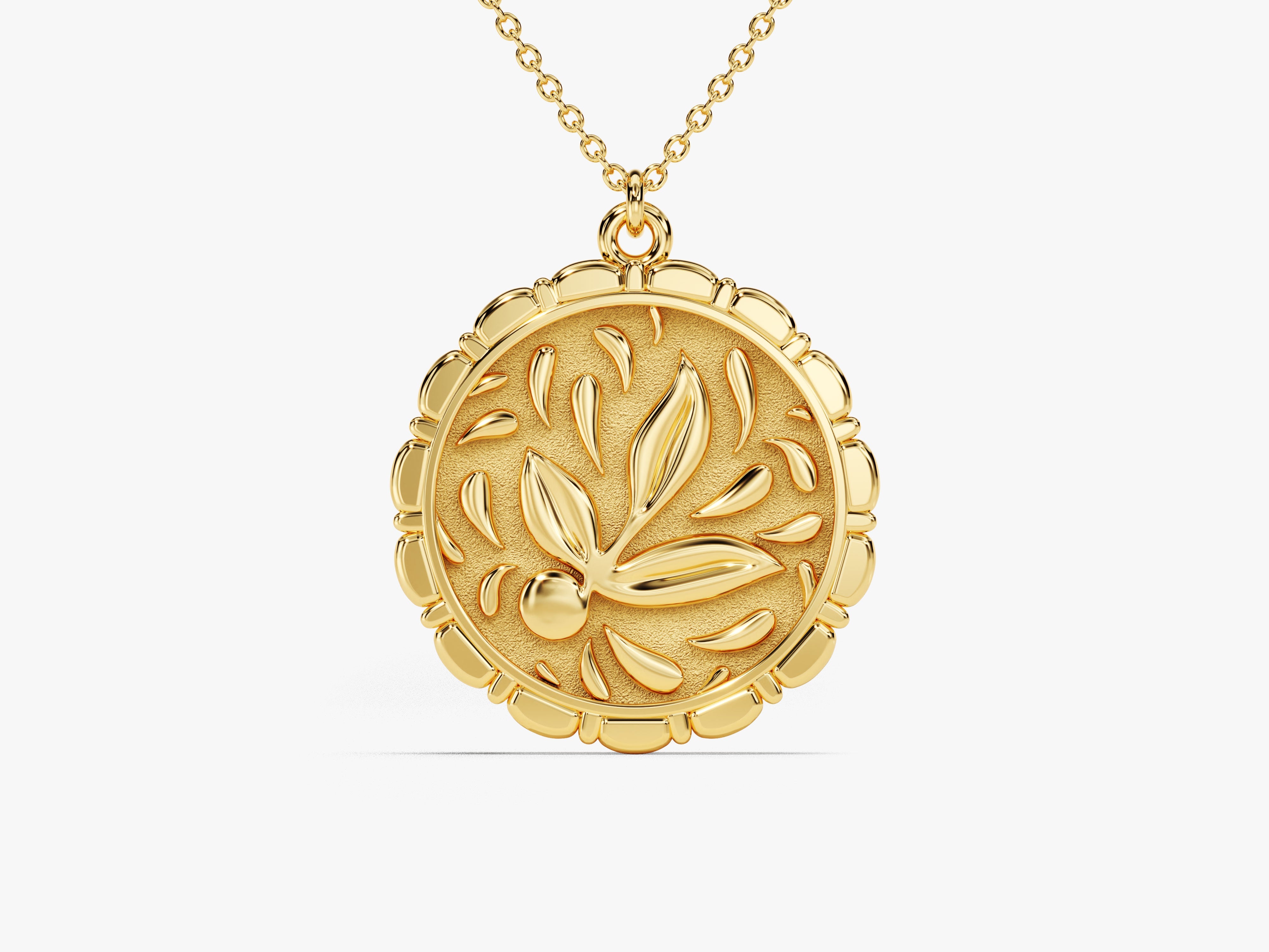 Gold pendant necklace with embossed floral design