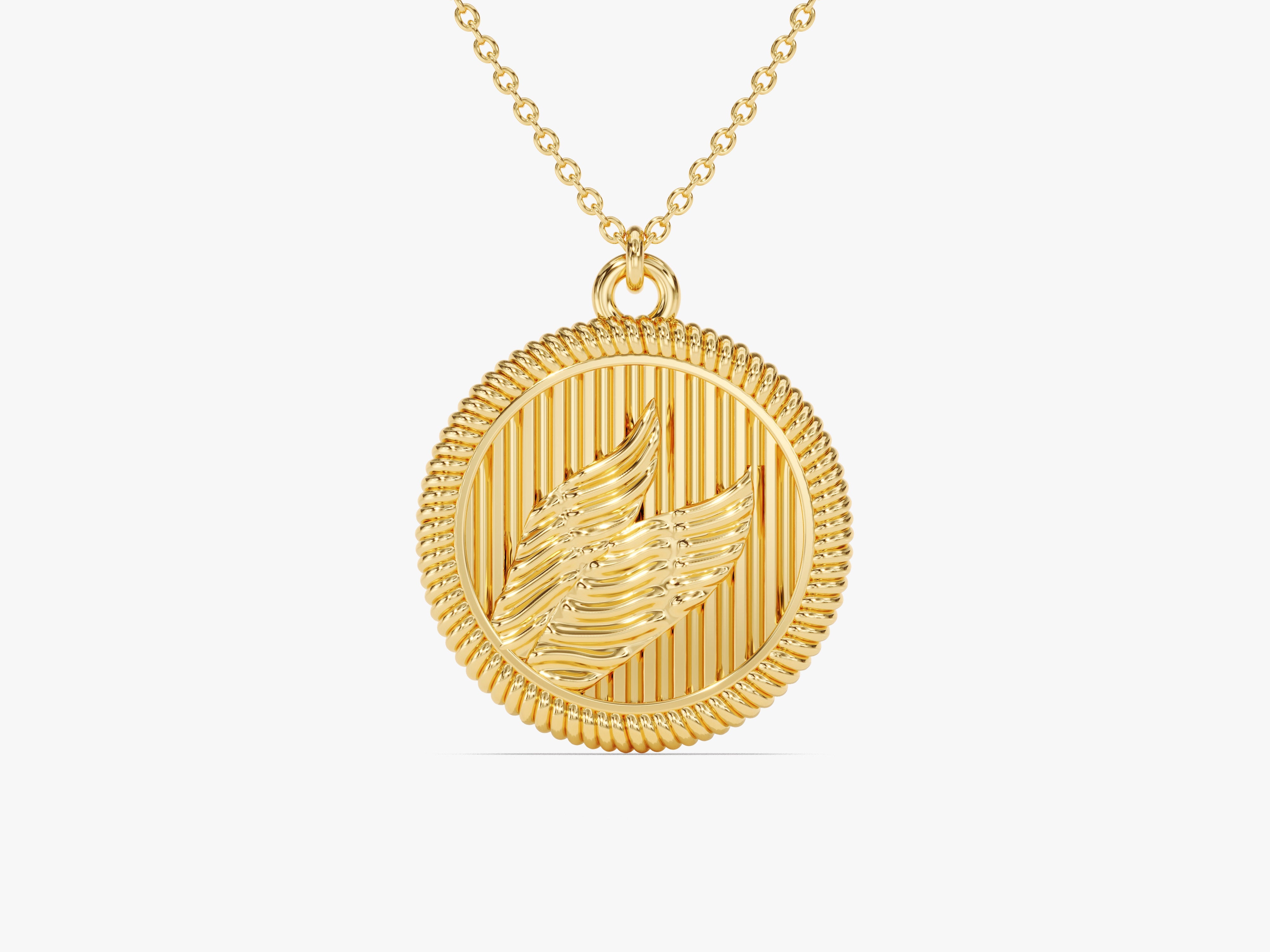 Gold necklace with winged medallion pendant jewelry