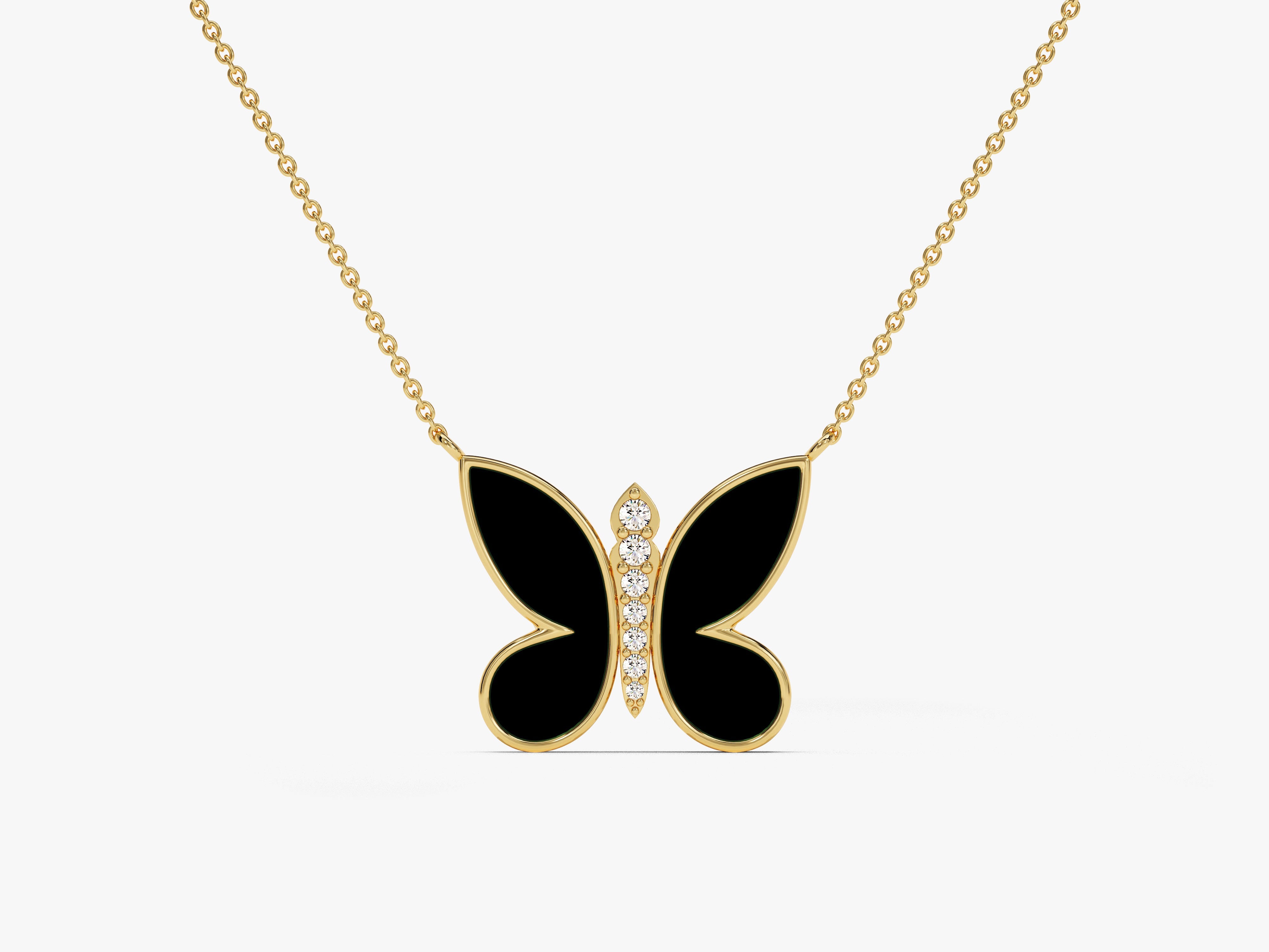 Gold butterfly necklace with black enamel and diamonds