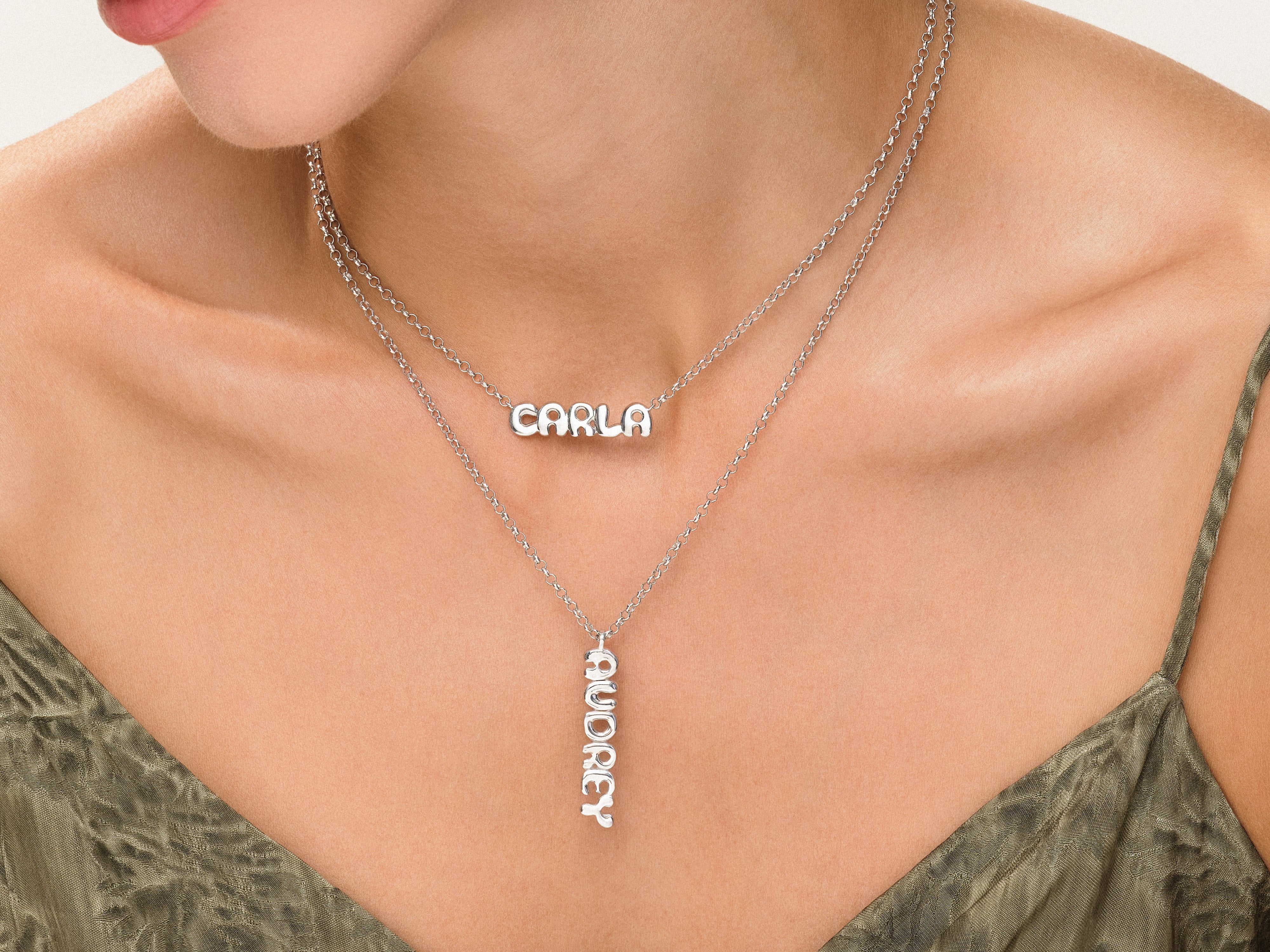 Silver name necklaces CARLA and AUDREY on model