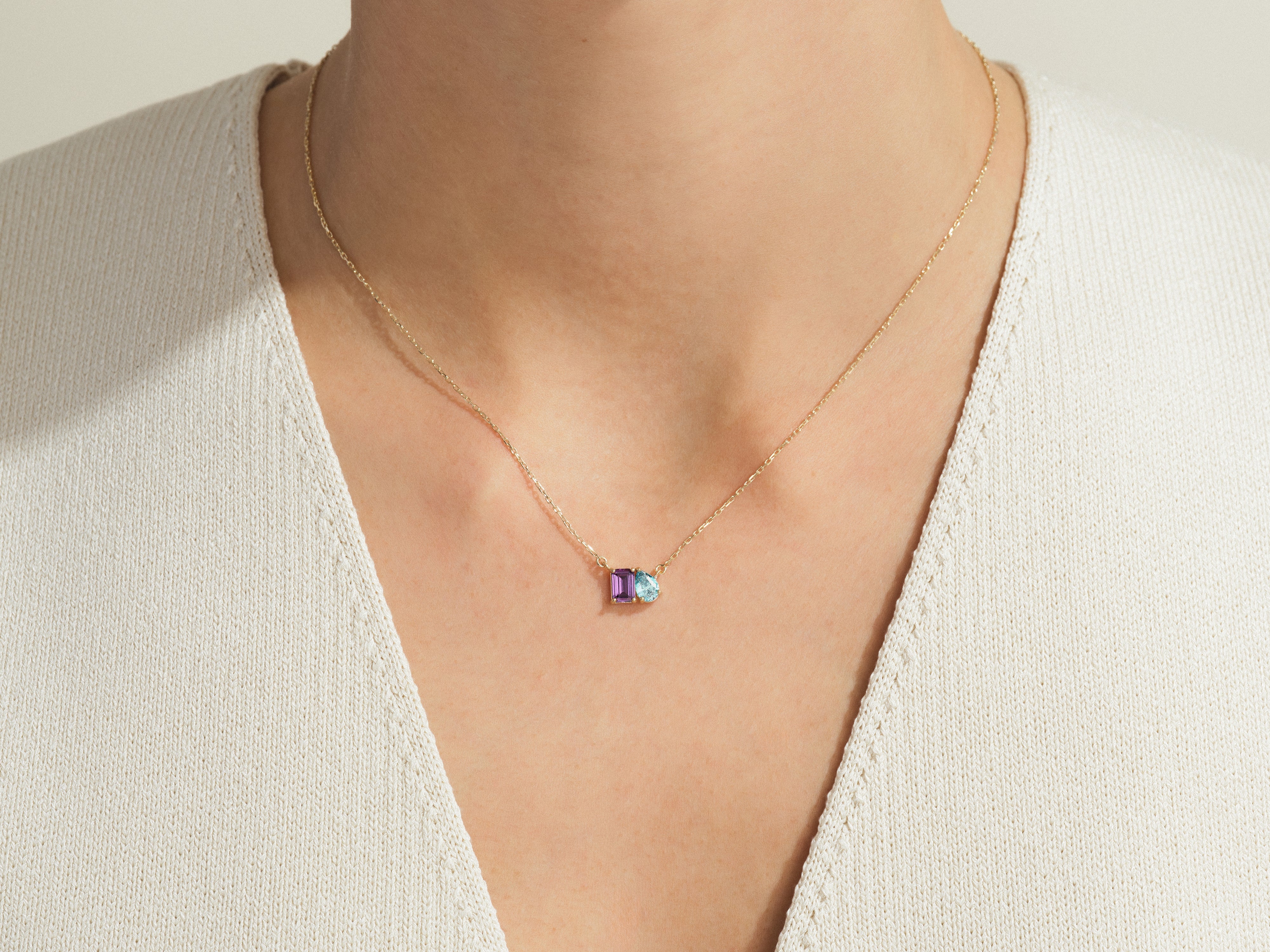 Gold necklace with amethyst and aquamarine gemstones