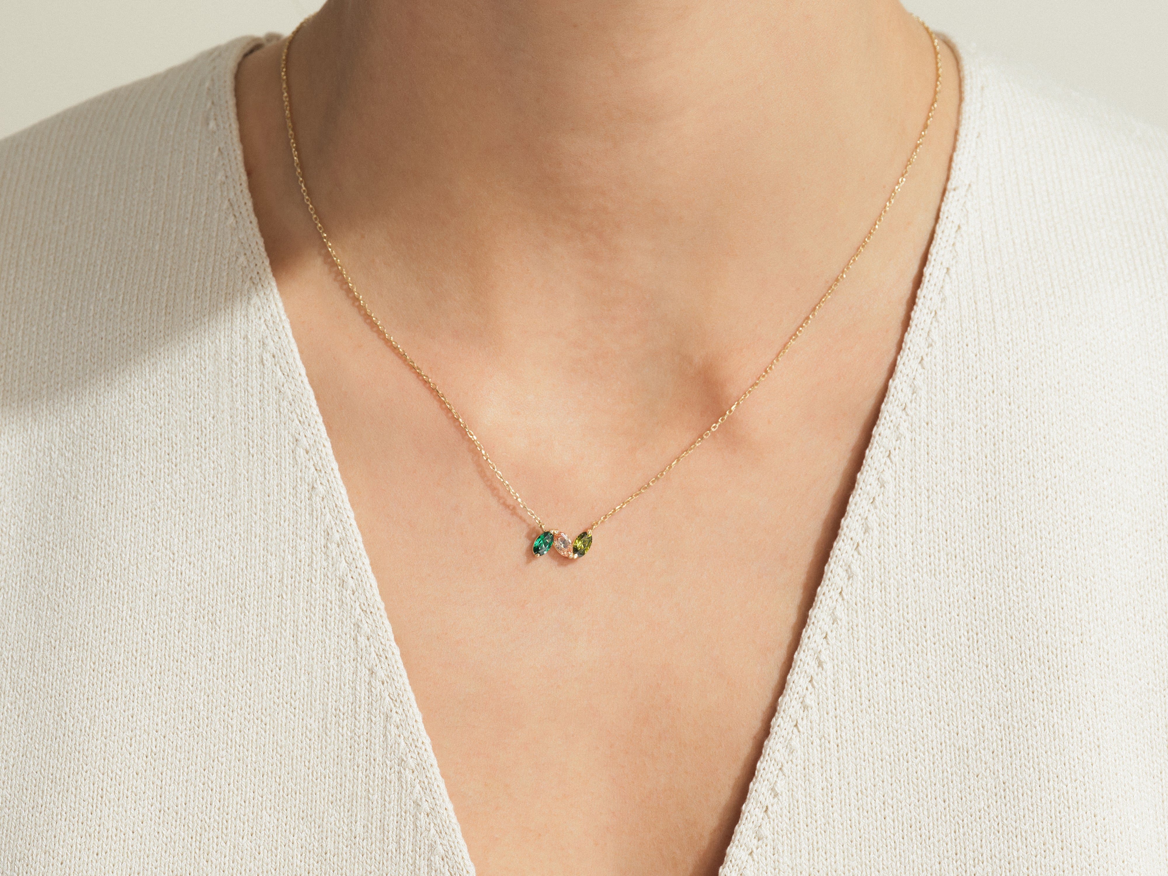 Gold necklace with colorful gemstones, fine jewelry