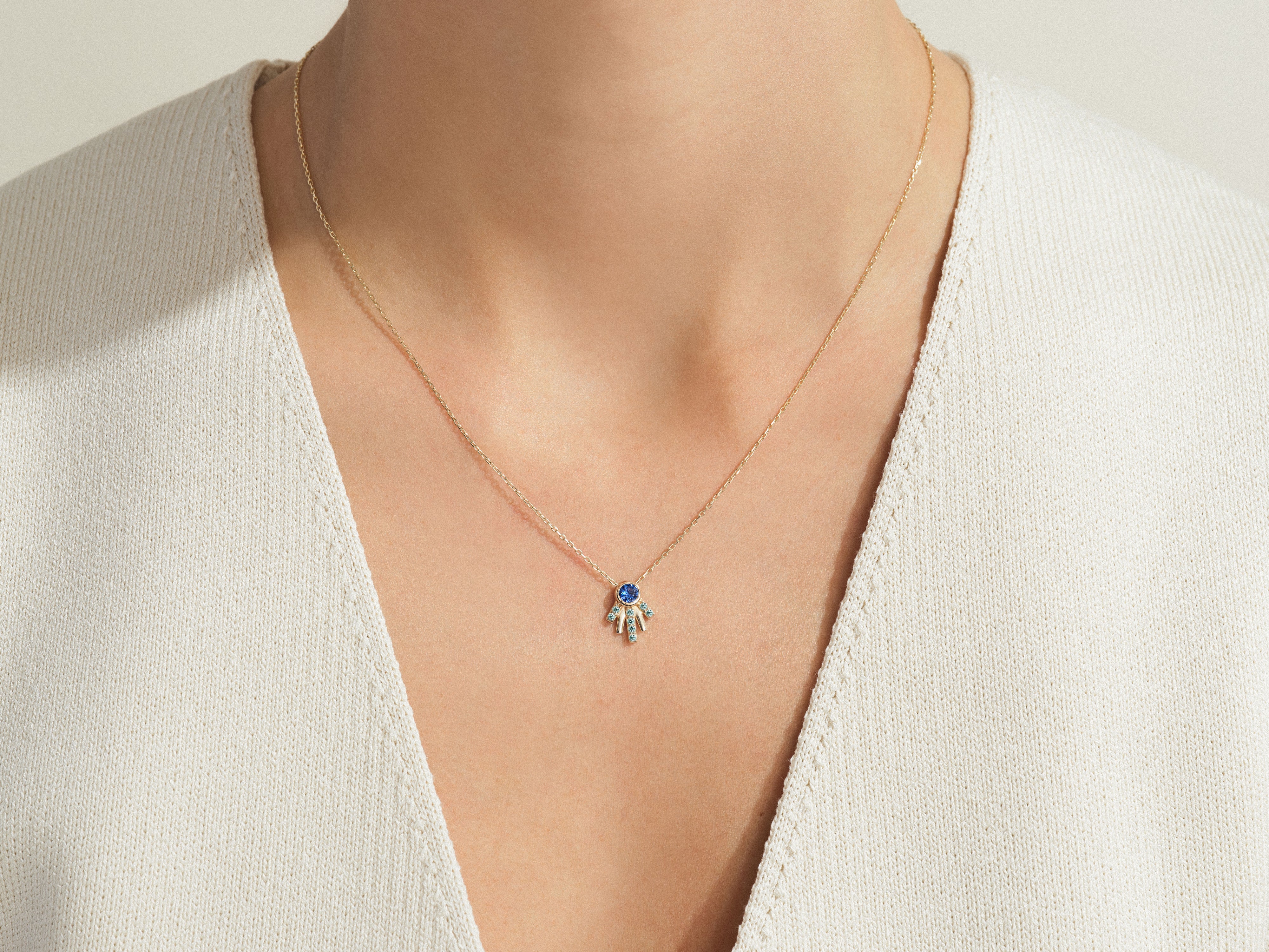 Gold necklace with blue sapphire and diamond pendant jewelry