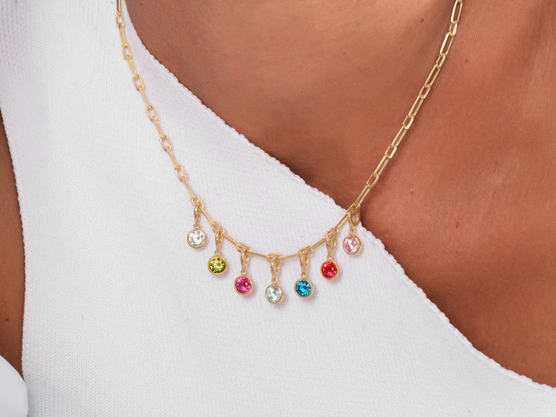 Gold necklace with colorful gemstone charms, fine jewelry