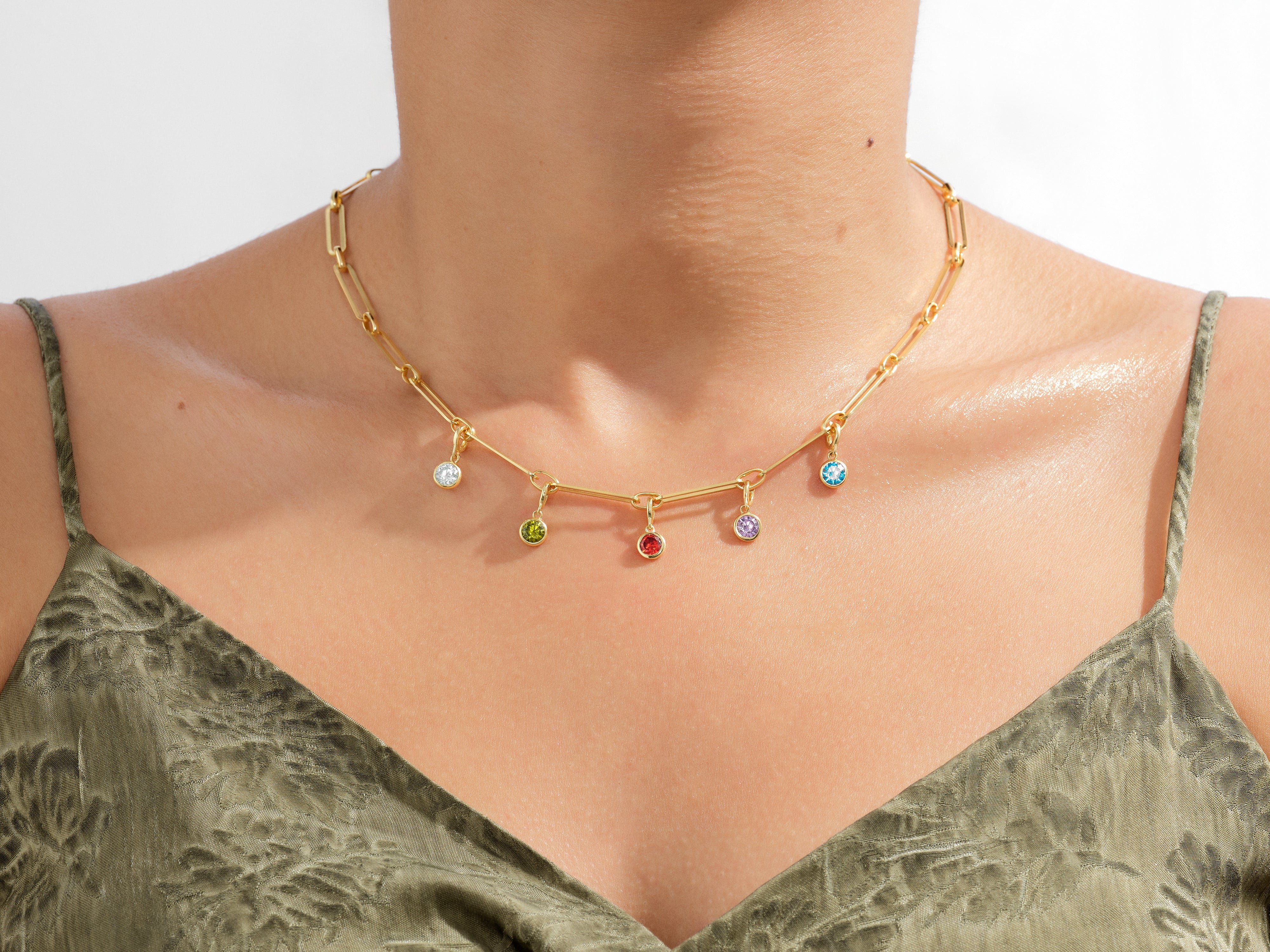 Gold paperclip chain necklace with colorful gemstone charms