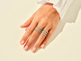 Diamond stacked rings on a hand, fine jewelry for women