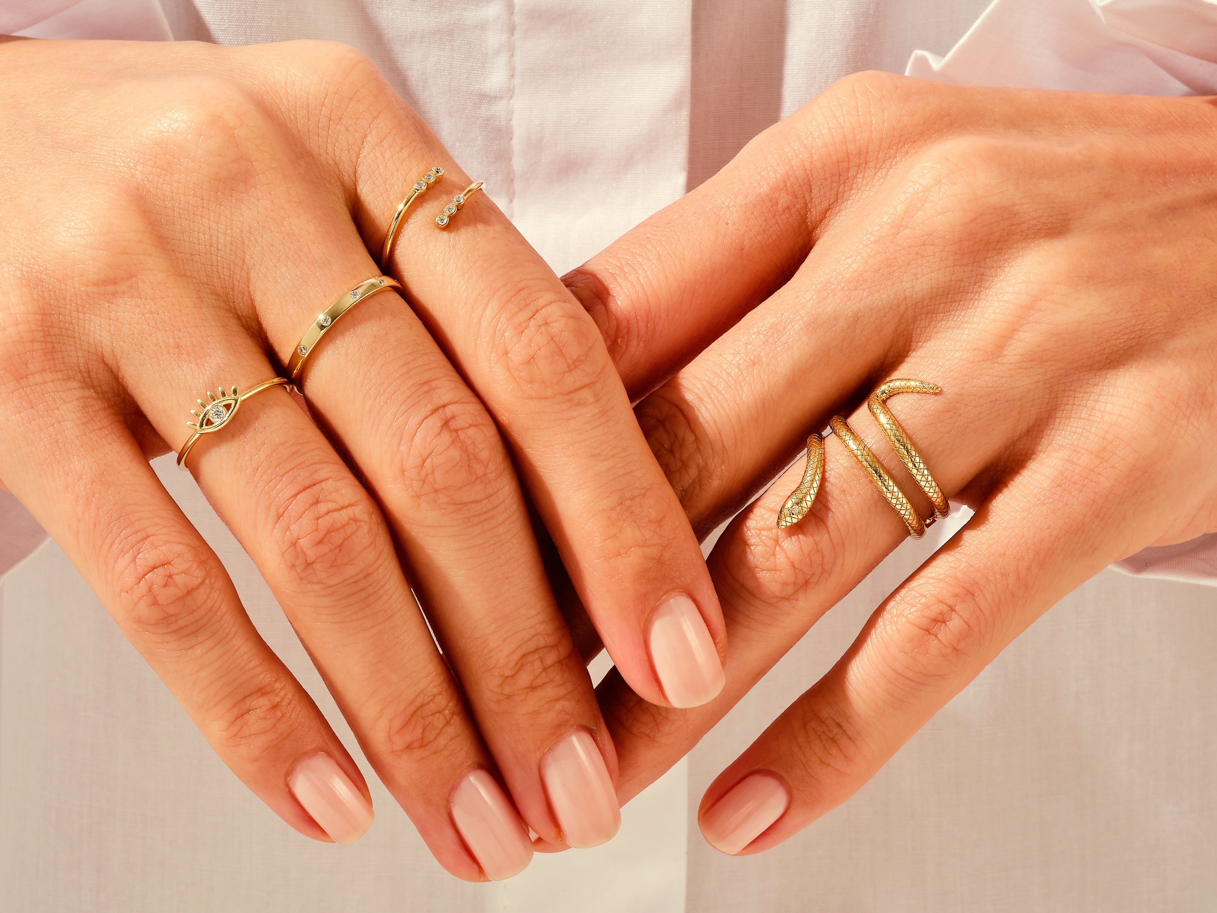 Gold rings with diamonds on hands, jewelry for women