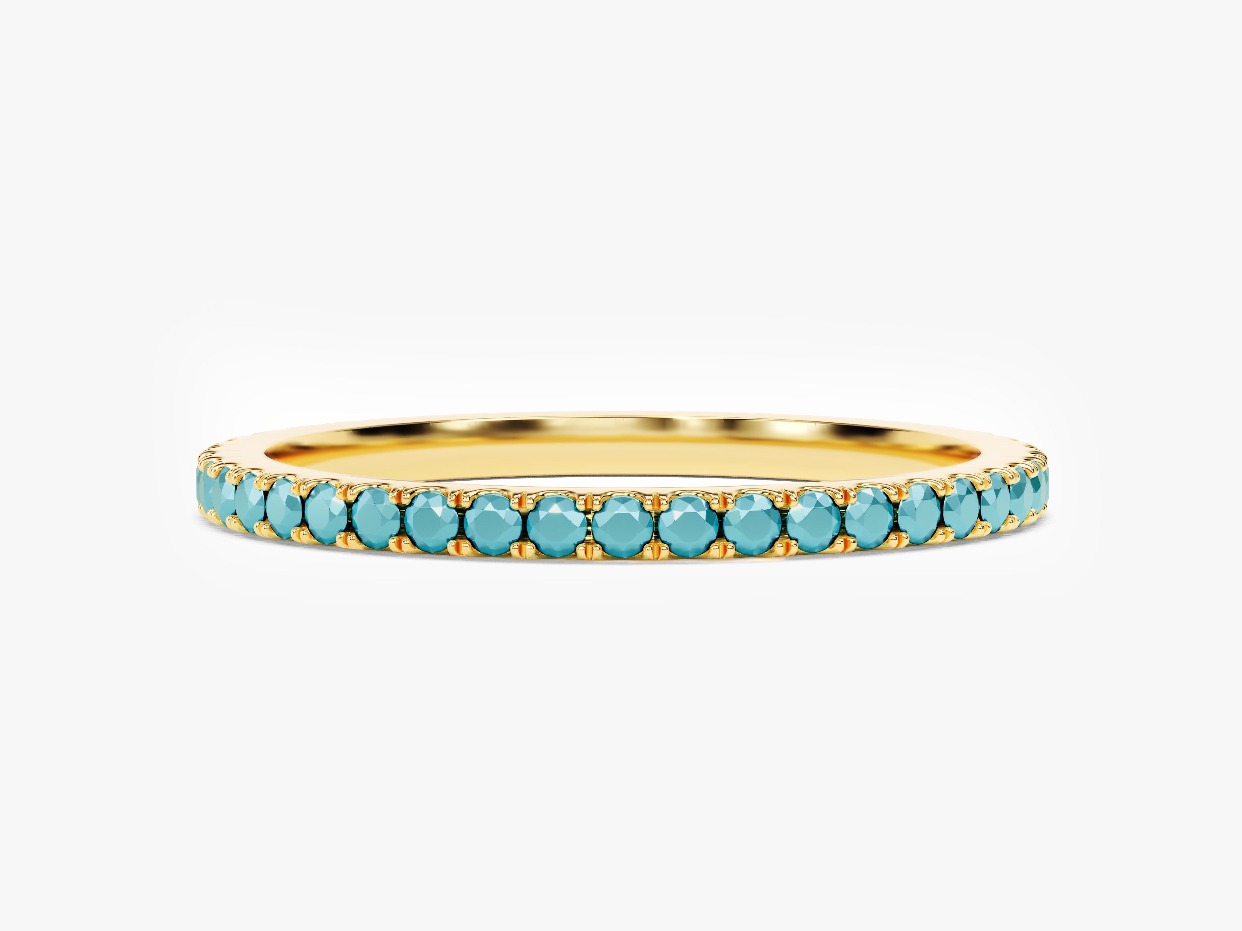 Gold ring with turquoise gemstones, fine jewelry, elegant design