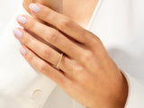 Diamond eternity ring on a woman's hand