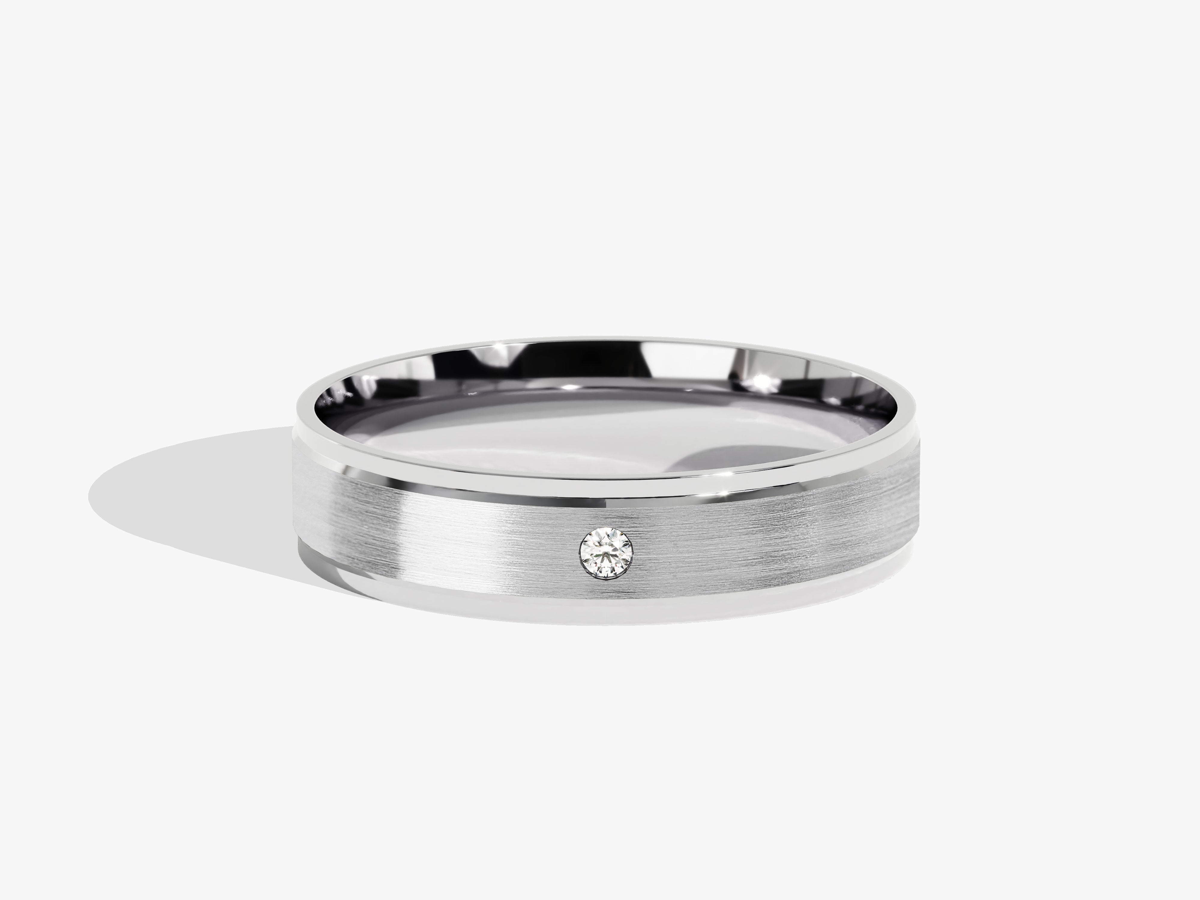 Men's brushed silver ring with a single diamond accent