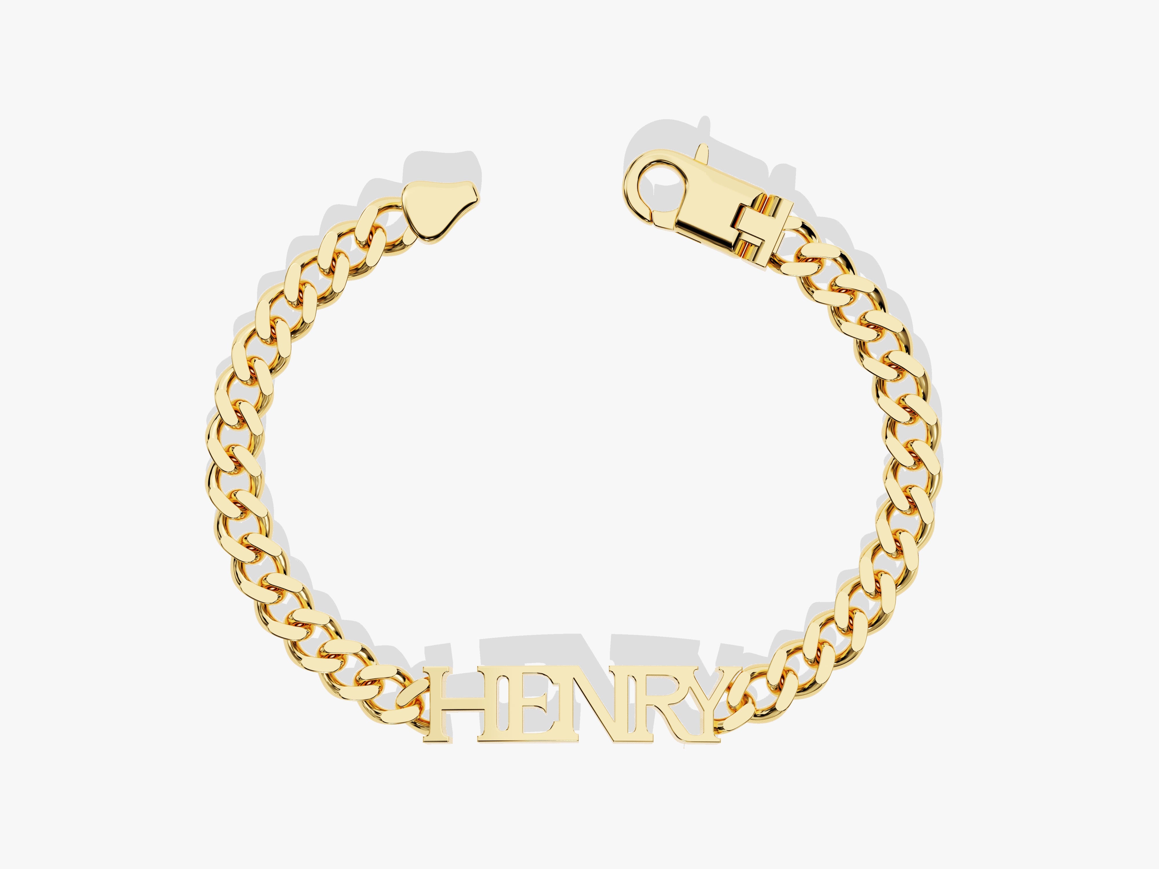 Gold cuban link bracelet with custom "HENRY" nameplate jewelry