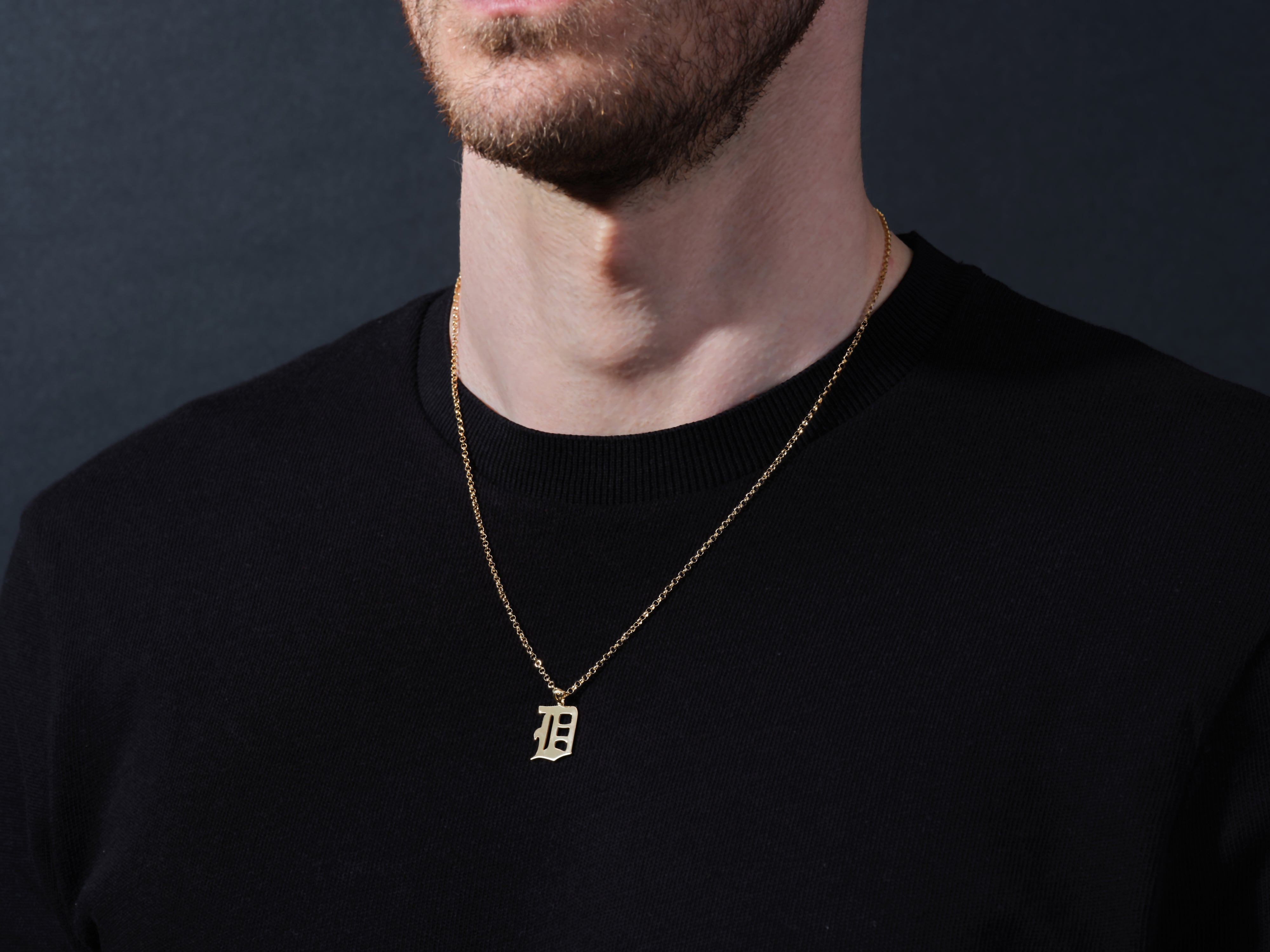 Gold letter 'B' necklace on a man, jewelry for him