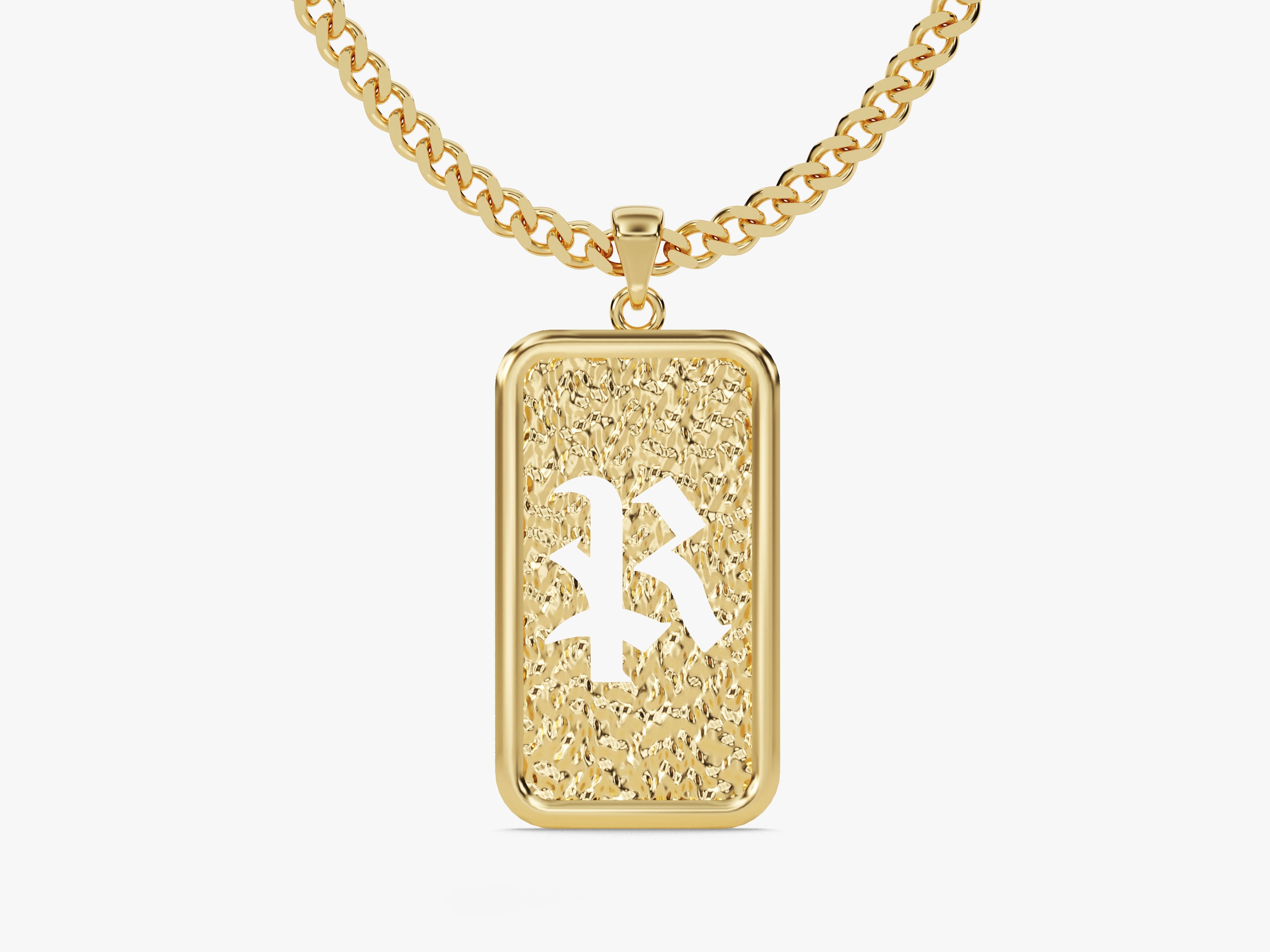 Gold chain necklace with textured rectangular pendant featuring white letter R