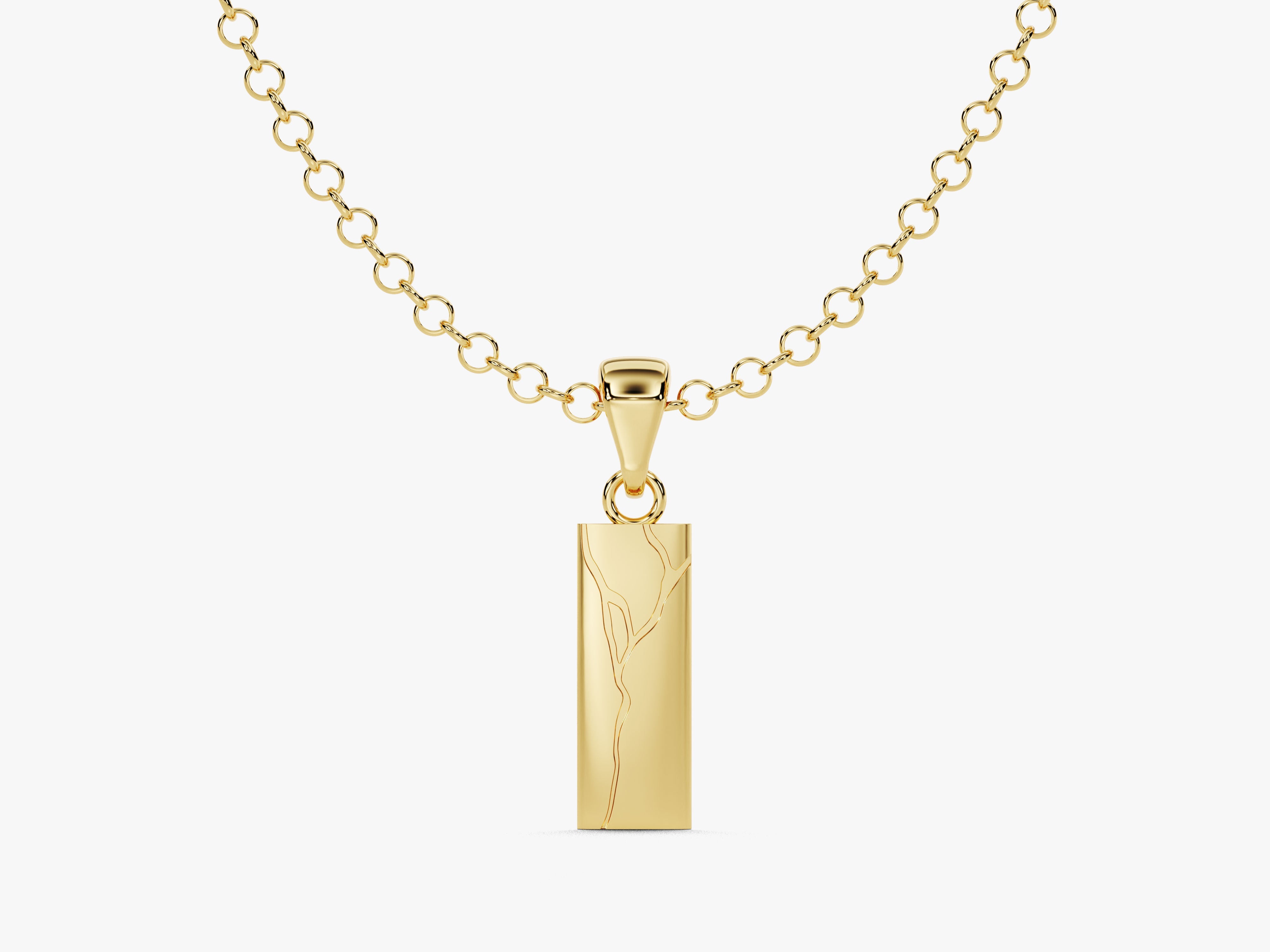 Gold bar pendant necklace with abstract etched design