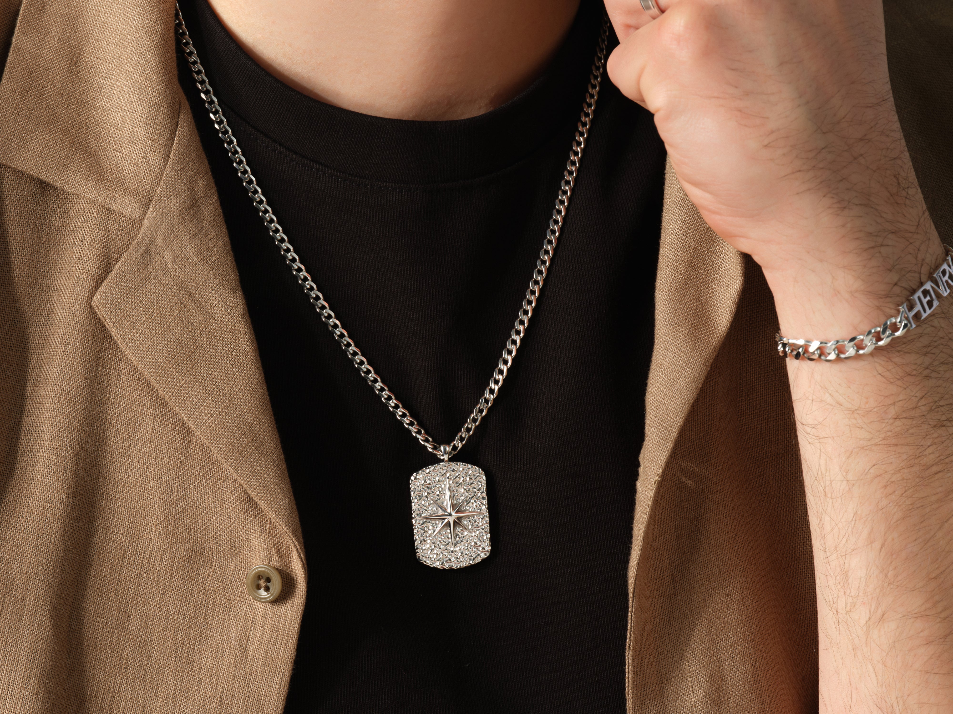Men's silver dog tag necklace with diamond accents and chain bracelet