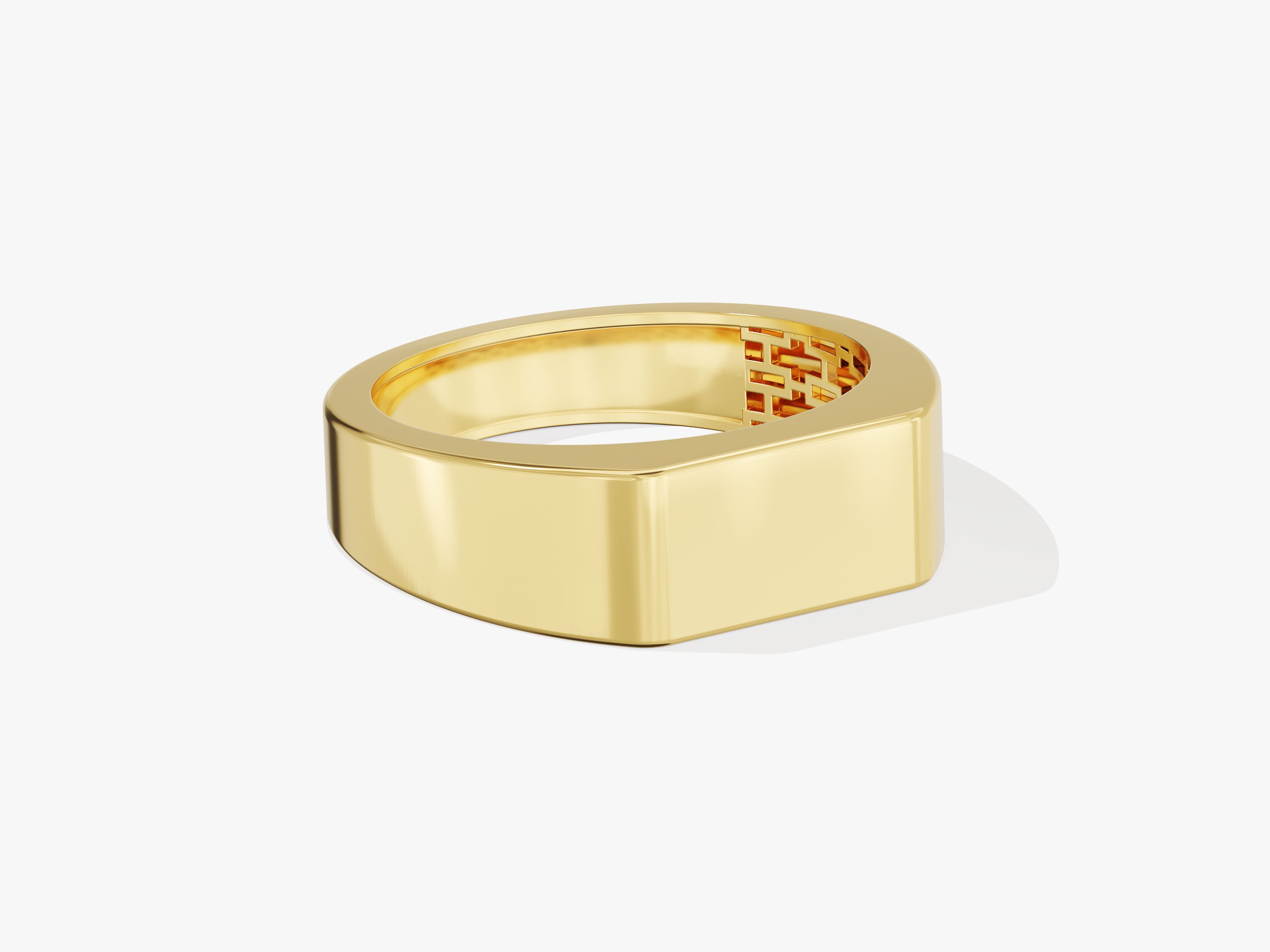 Gold signet ring with geometric pattern detail