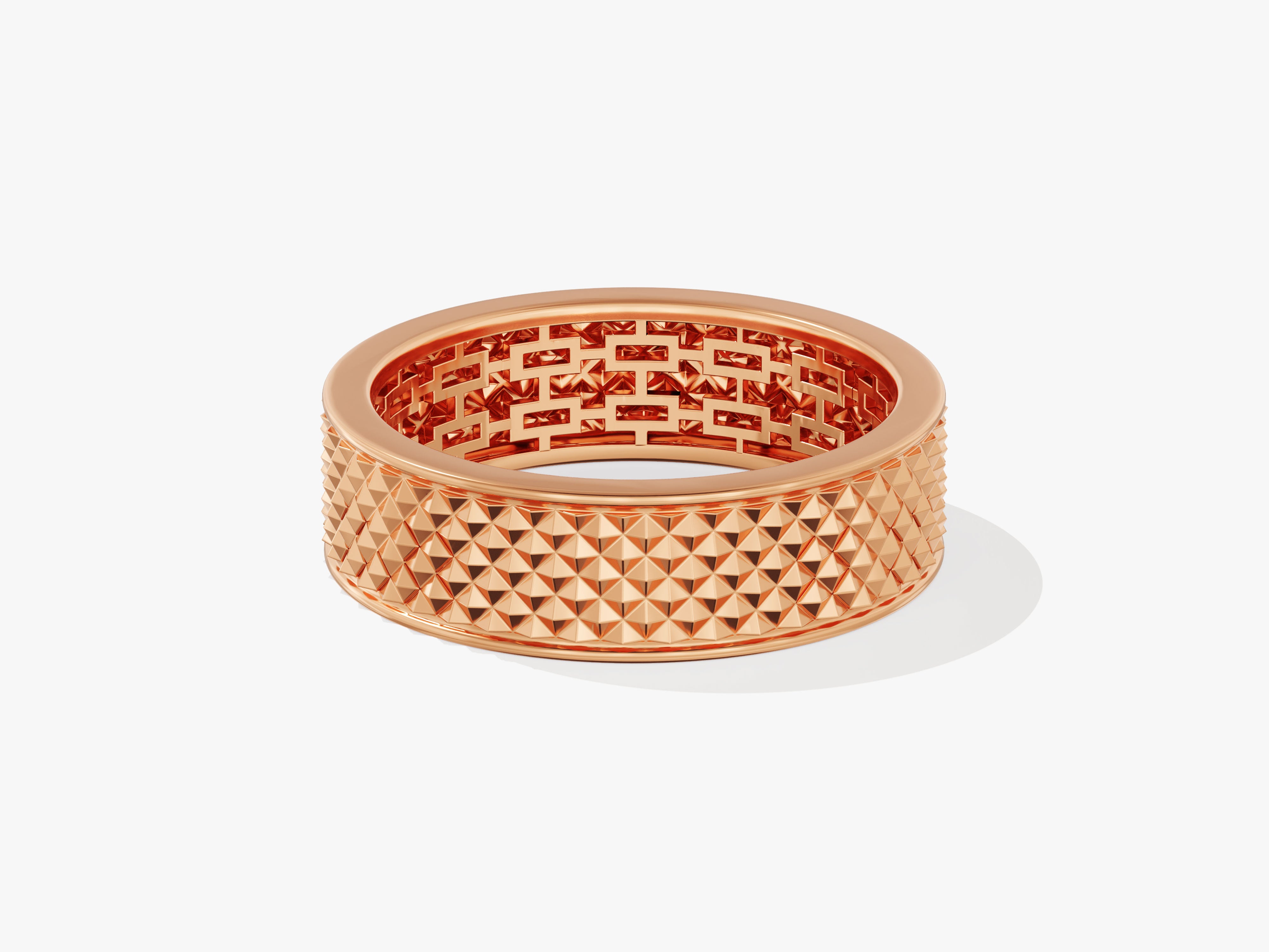 Rose gold ring with geometric pyramid texture and openwork design