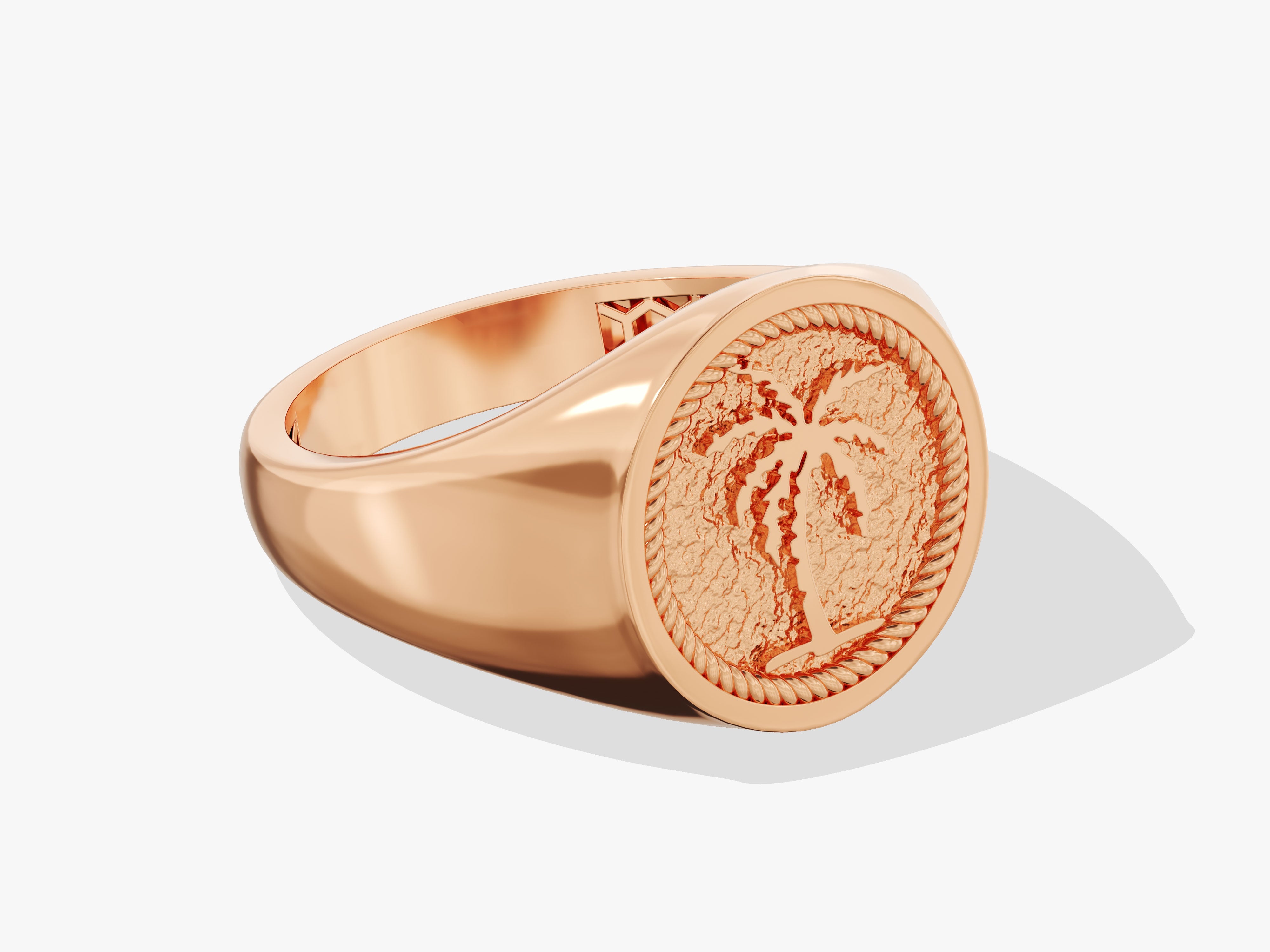 Rose gold signet ring with palm tree engraving and rope detail