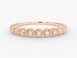 Rose gold diamond band ring with beaded bezel setting