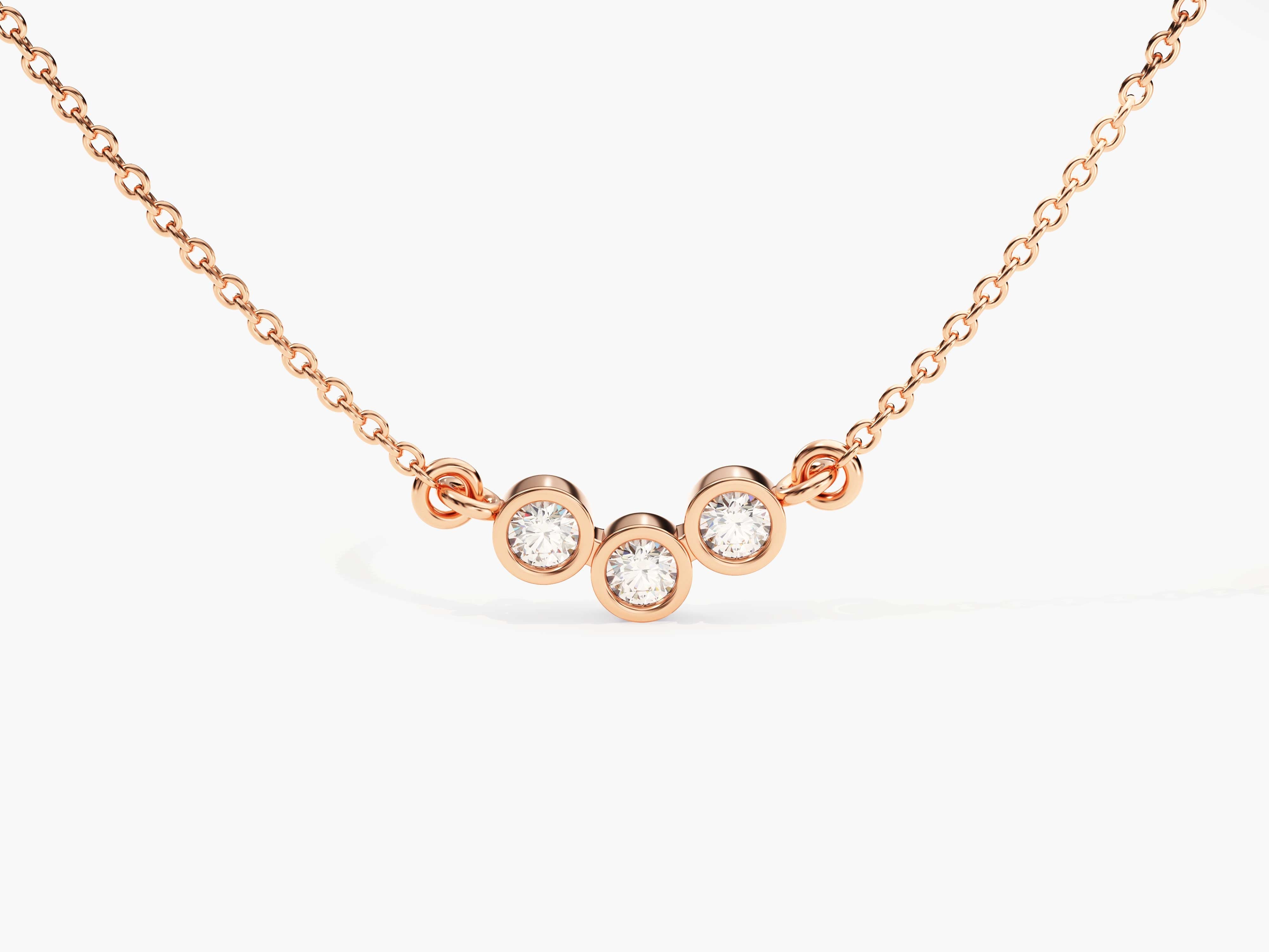 Rose gold necklace with three bezel-set diamonds