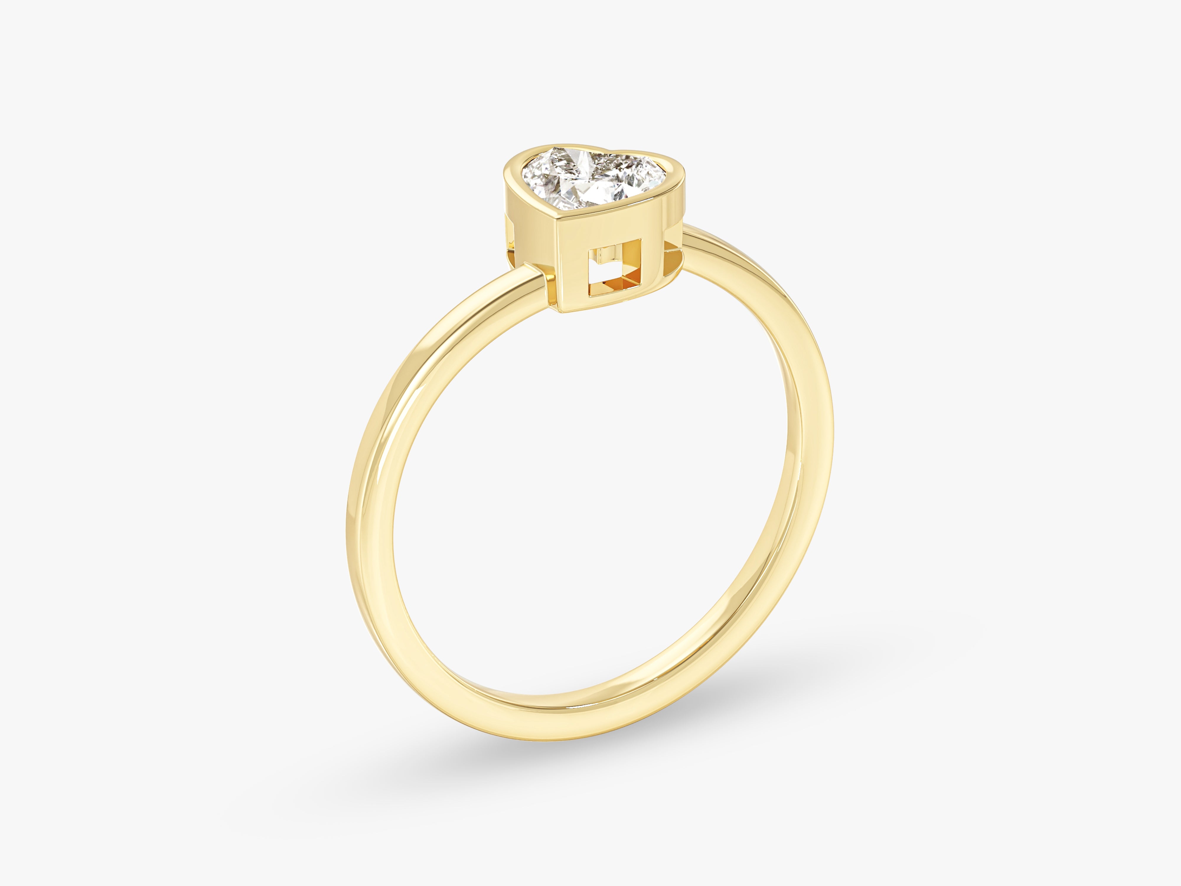 Gold ring with heart-shaped diamond solitaire jewelry