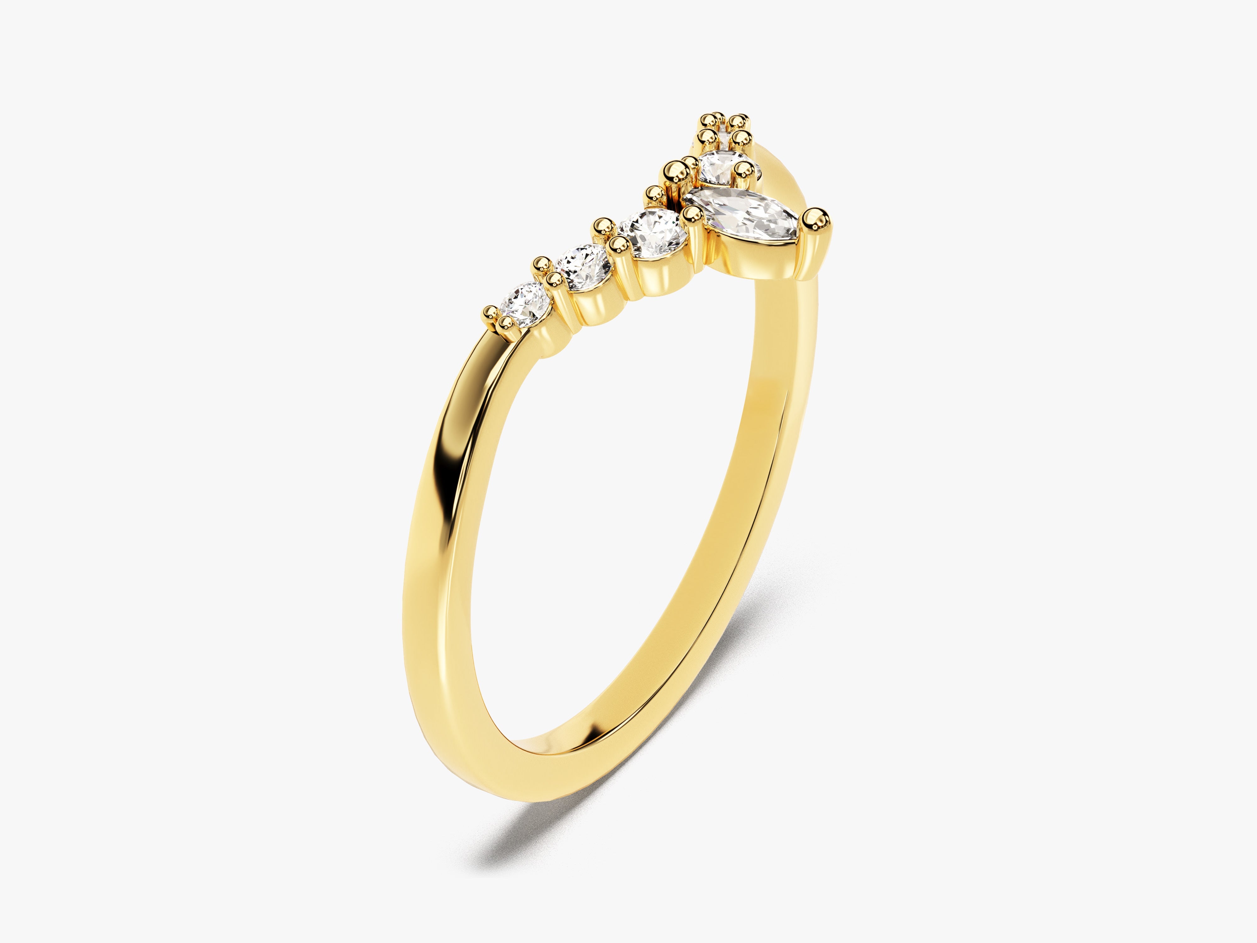 Gold marquise diamond ring with small accent stones