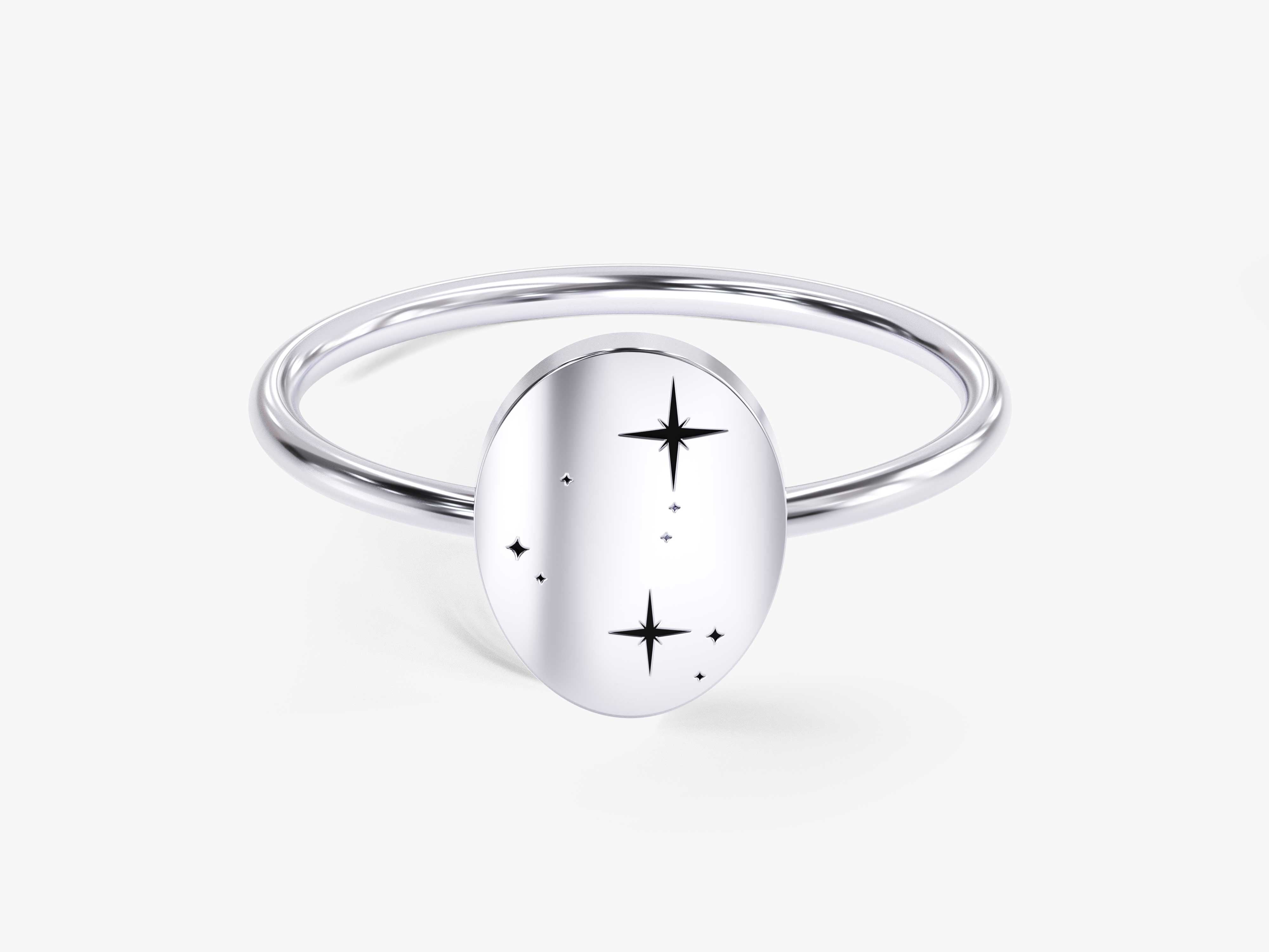 Silver oval ring with starburst design, jewelry