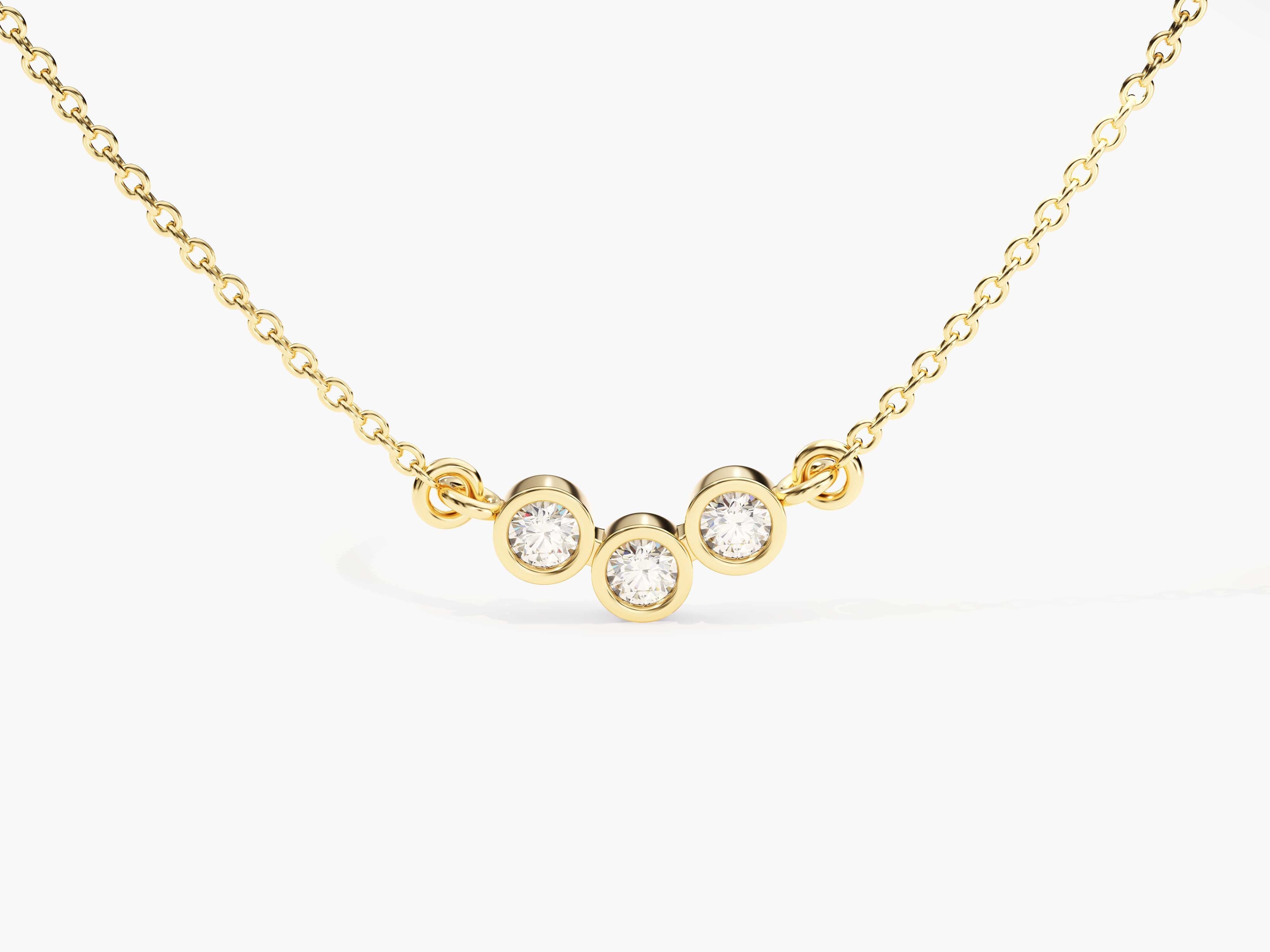 Gold necklace with three bezel-set diamonds