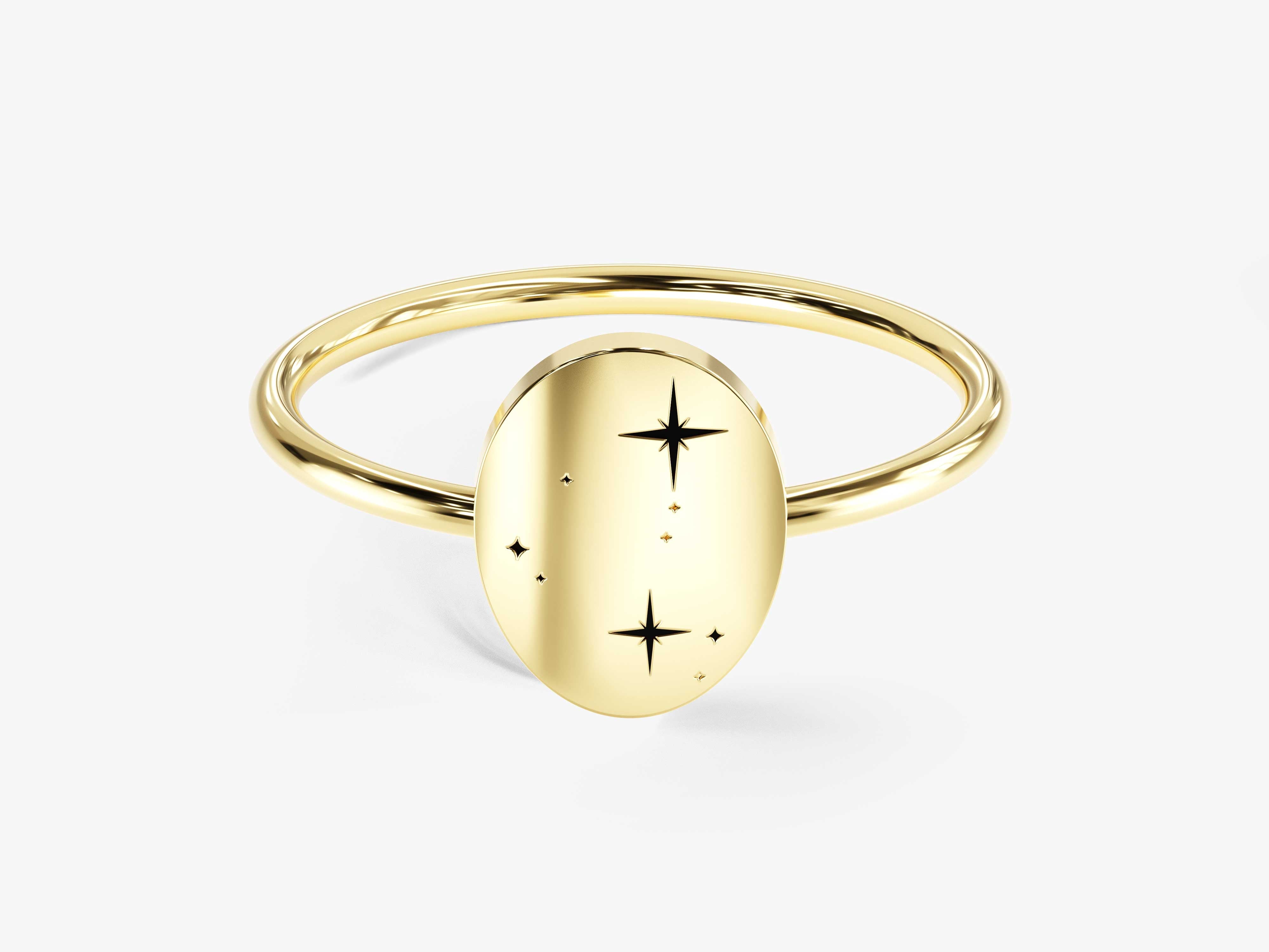 Gold oval ring with starburst design, fine jewelry