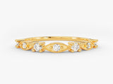 Gold diamond ring with intricate detailing and sparkling stones