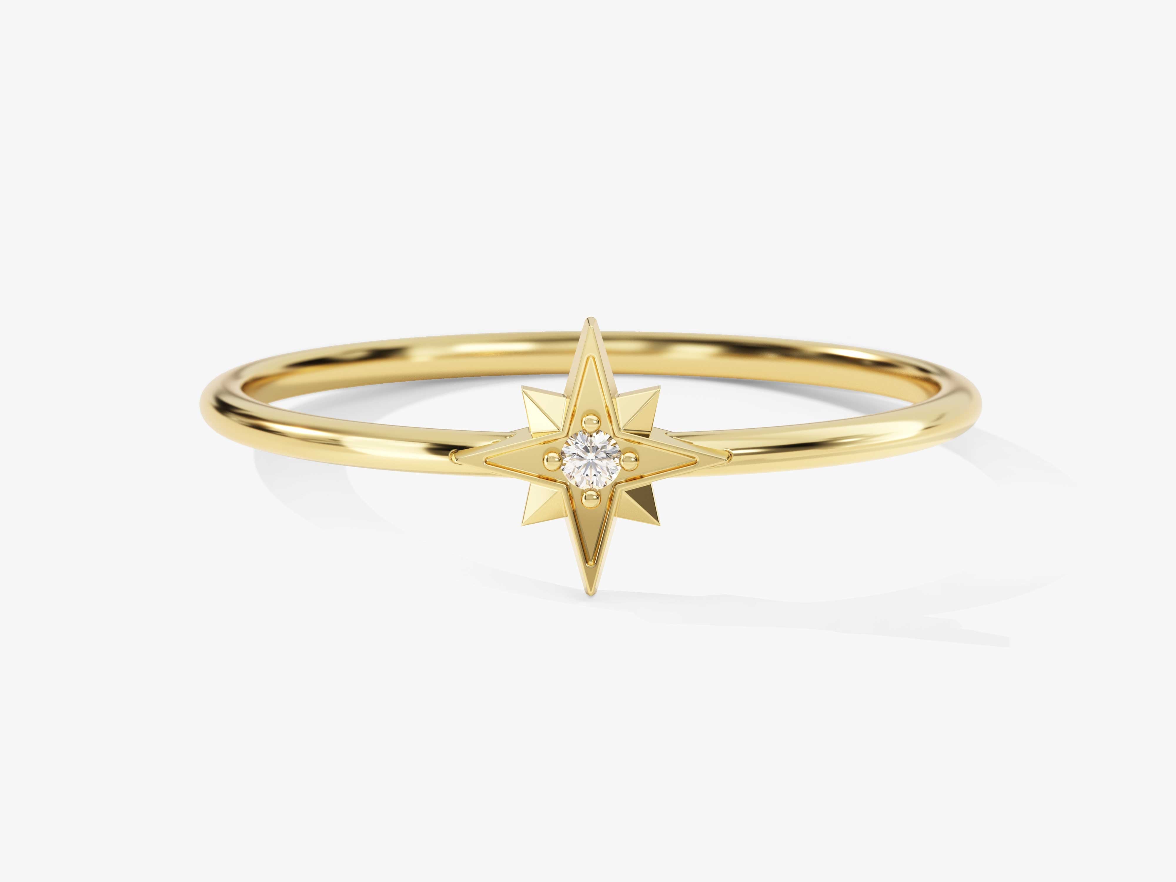 Gold ring with diamond starburst design