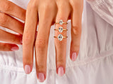 14k Gold, 18k Gold, Yellow, White, Rose, 4-Prong Oval Cut 1.5 carat Moissanite Engagement Rings on a Woman's Ring Finger